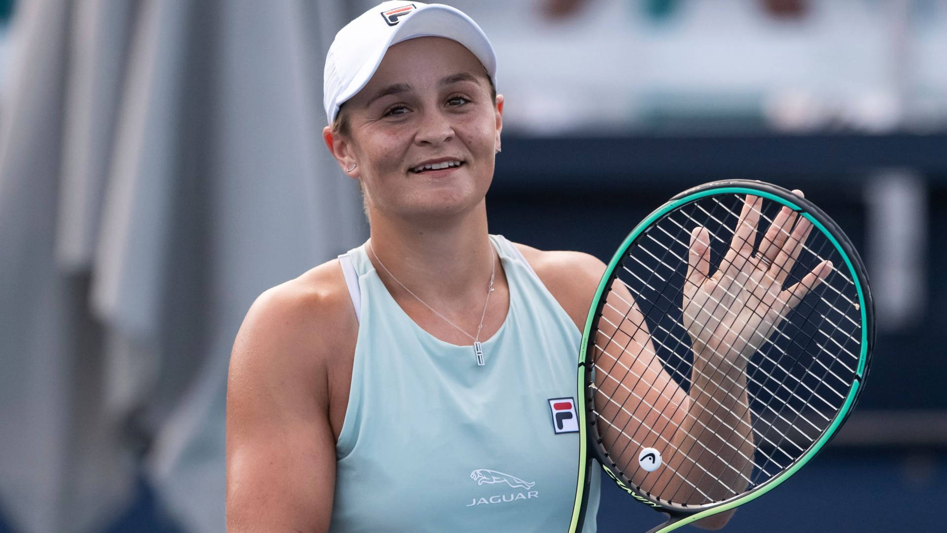 Champion Ashleigh Barty In Action Background