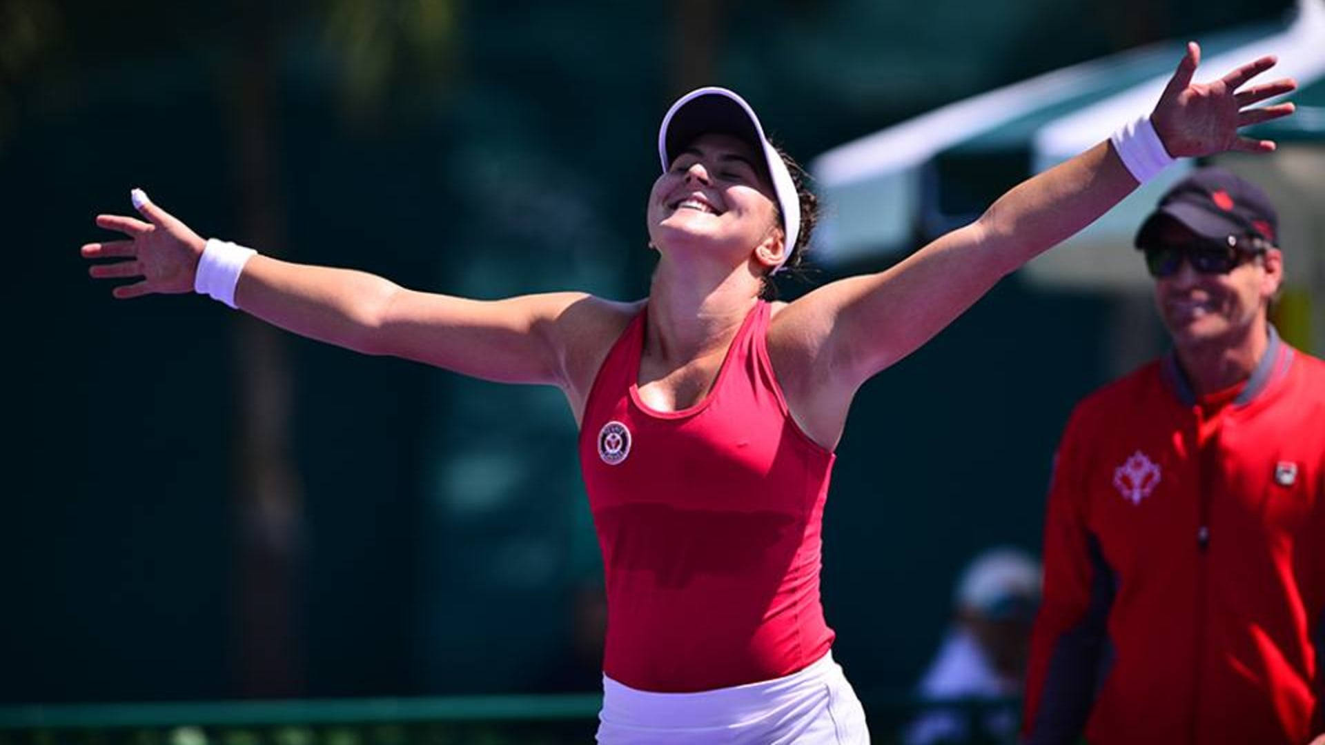 Champion Bianca Andreescu Celebrates A Stunning Victory Background