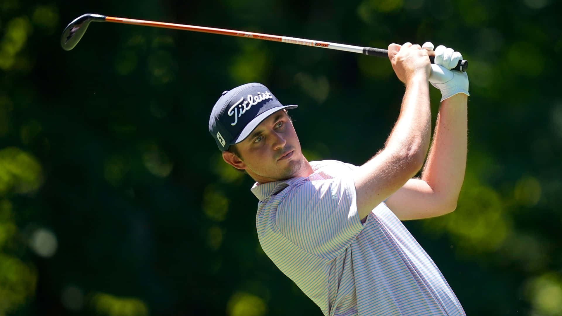 Champion Golfer Jt Poston At Swing Pinnacle With Golf Club Above His Head. Background