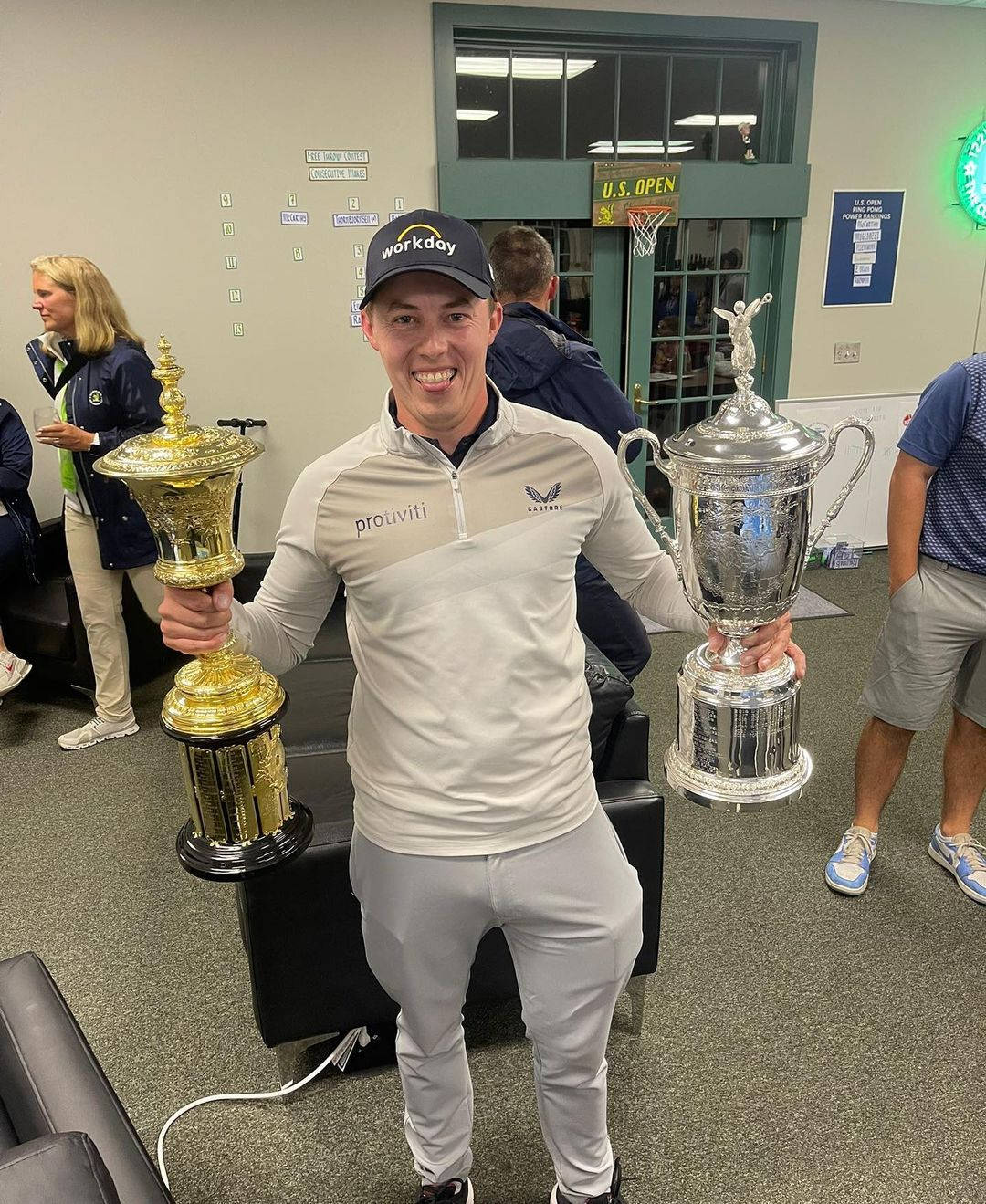 Champion Golfer Matt Fitzpatrick Enjoys His Victory By Holding Two Trophies