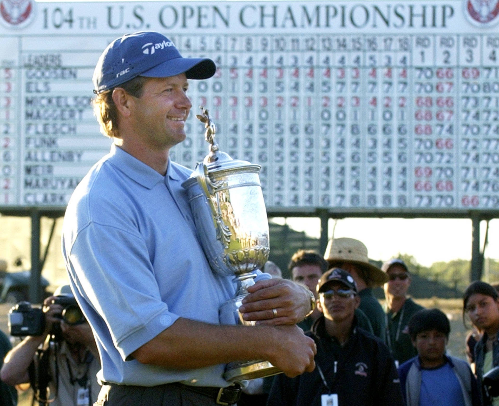 Champion Golfer Retief Goosen Embracing His Trophy