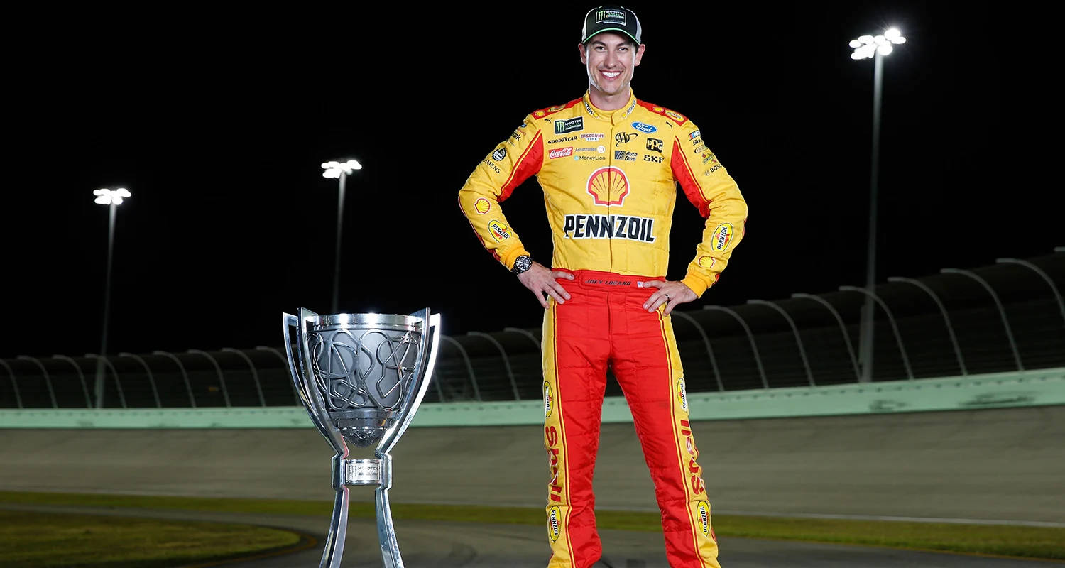 Champion Joey Logano With Trophy