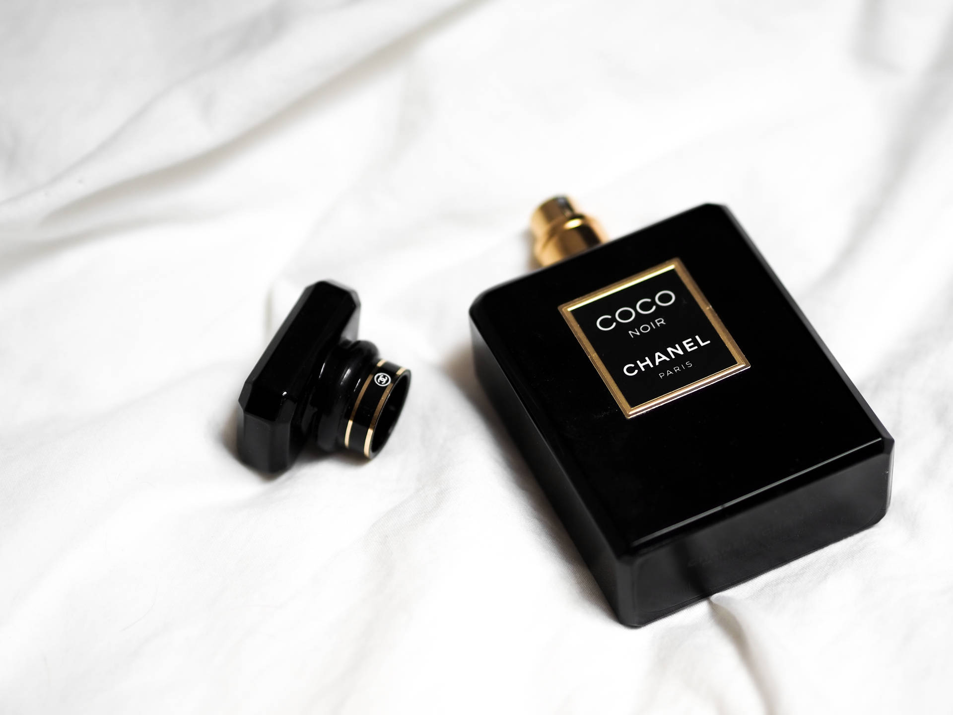 Chanel Perfume Bottle Black Aesthetic Background