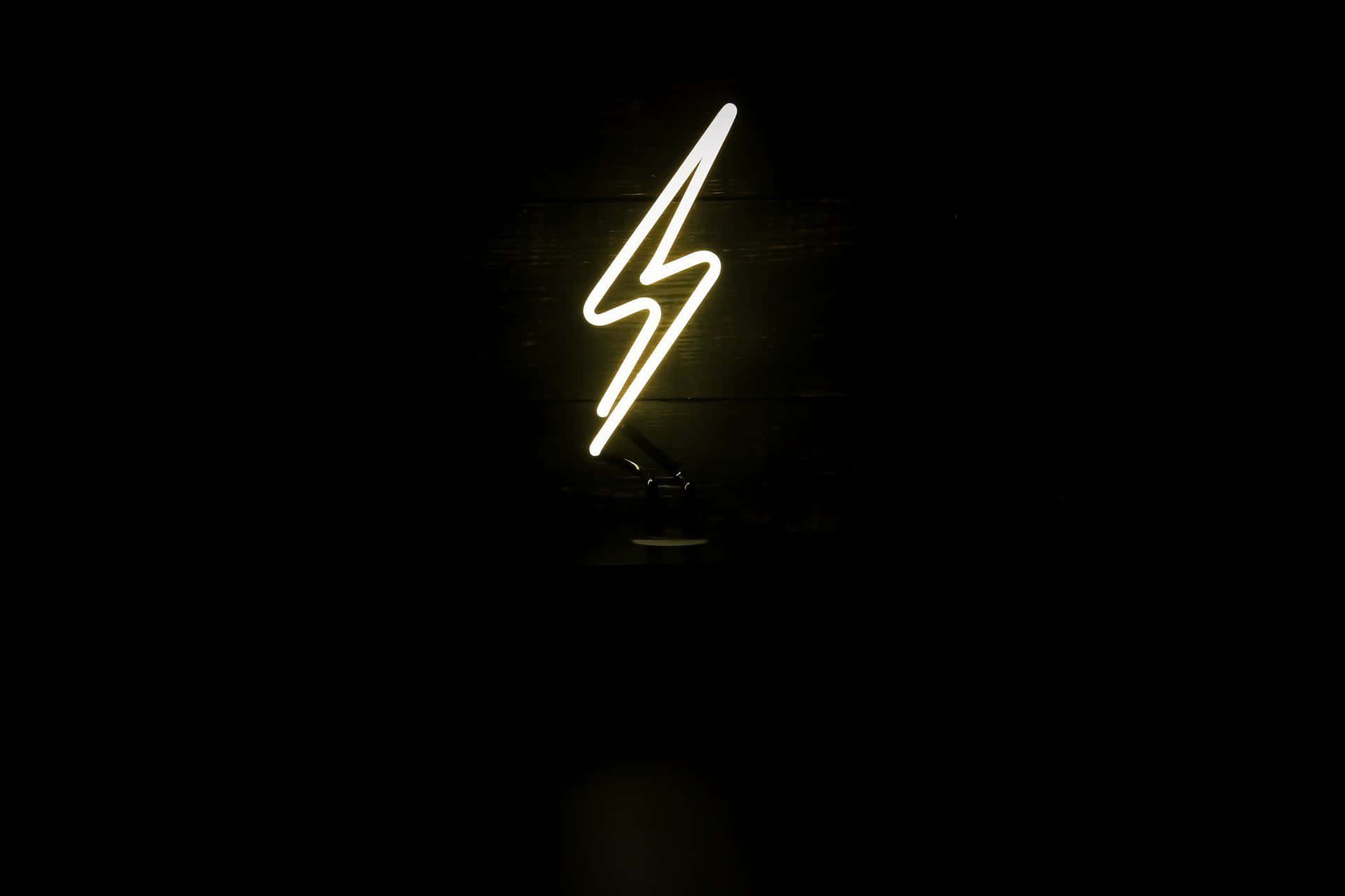 “charge Up Your Iphone With Lightning Bolt Technology” Background