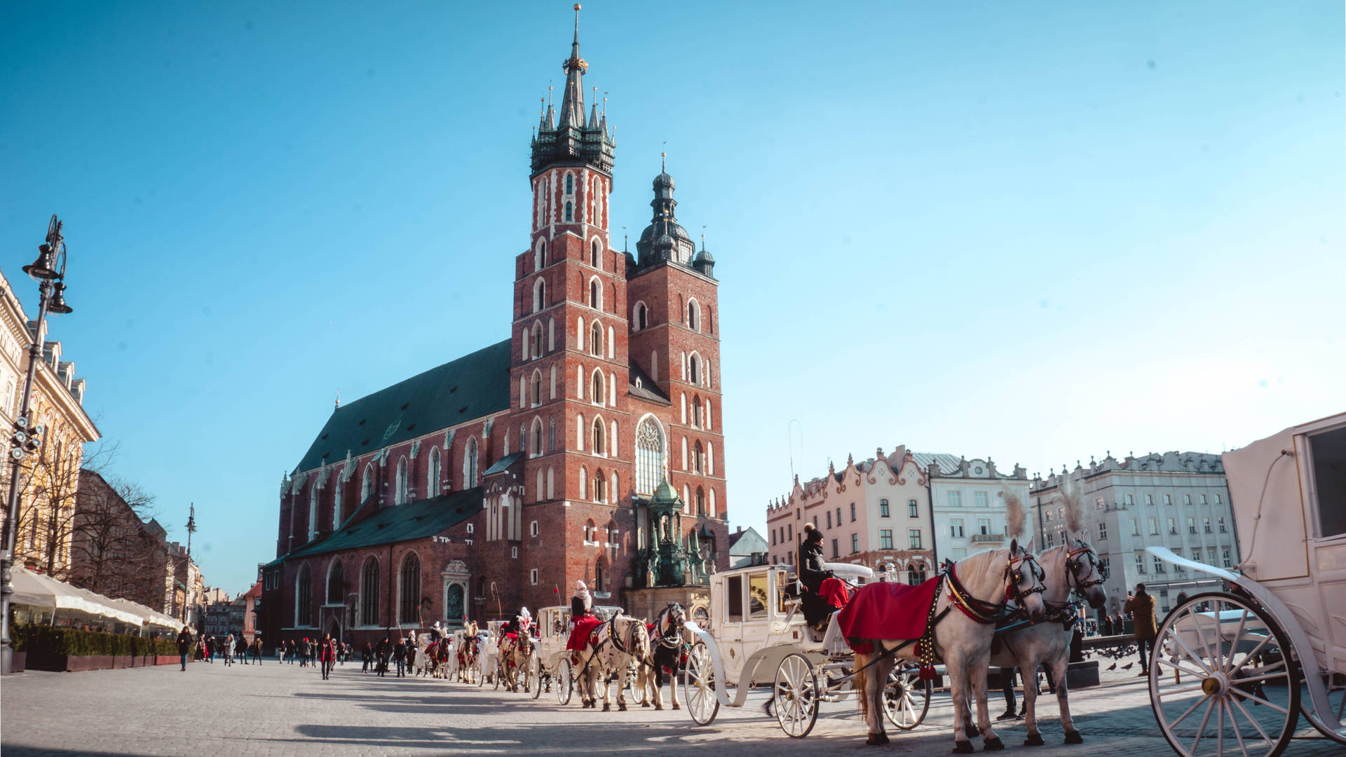 Chariots In Main Market Square, Krakow Poland Background