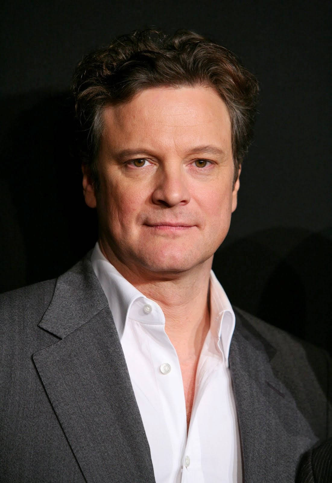 Charismatic Gaze: Close-up Portrait Of English Actor Colin Firth Background