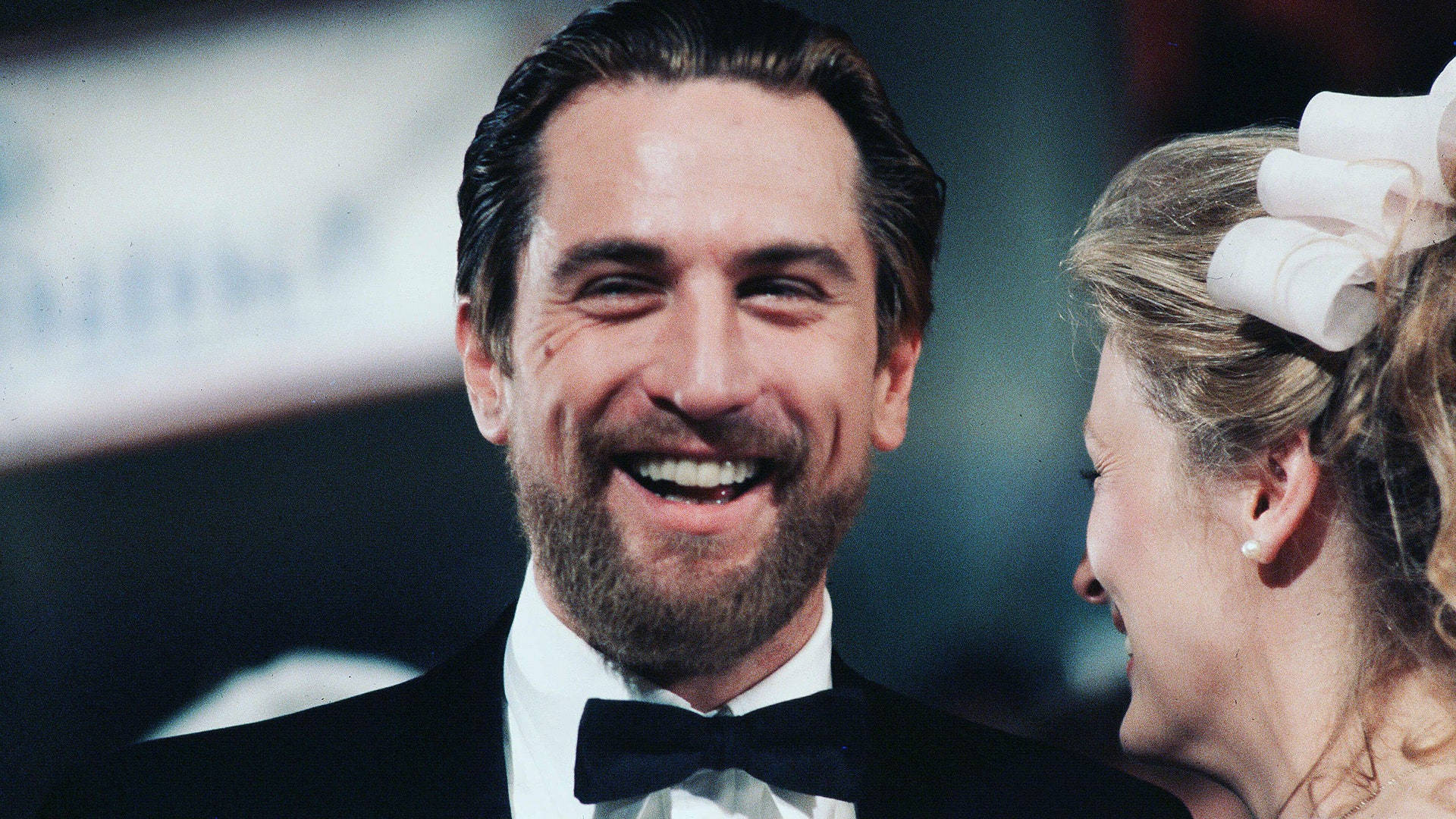 Charismatic Robert De Niro In Black Suit Background