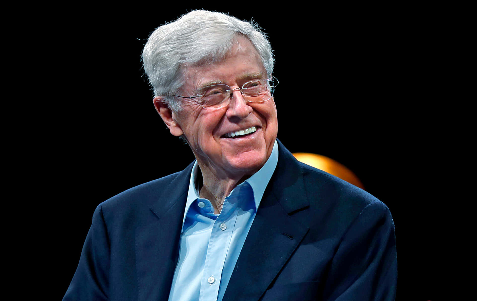 Charles G. Koch Against A Shiny Black Backdrop. Background