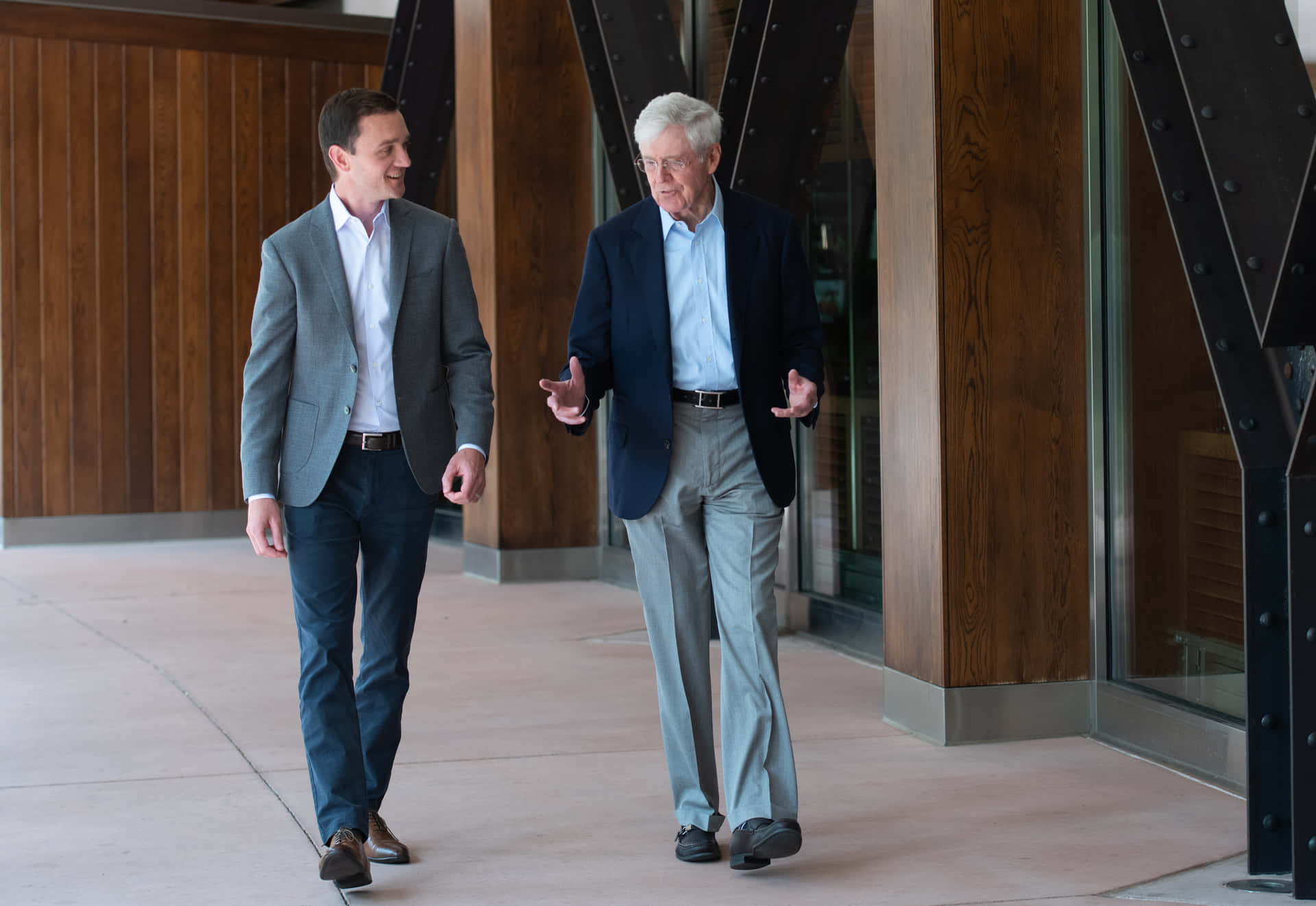 Charles G. Koch Walking Outside Background