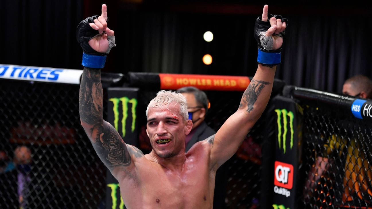 Charles Oliveira Index Fingers Up Background