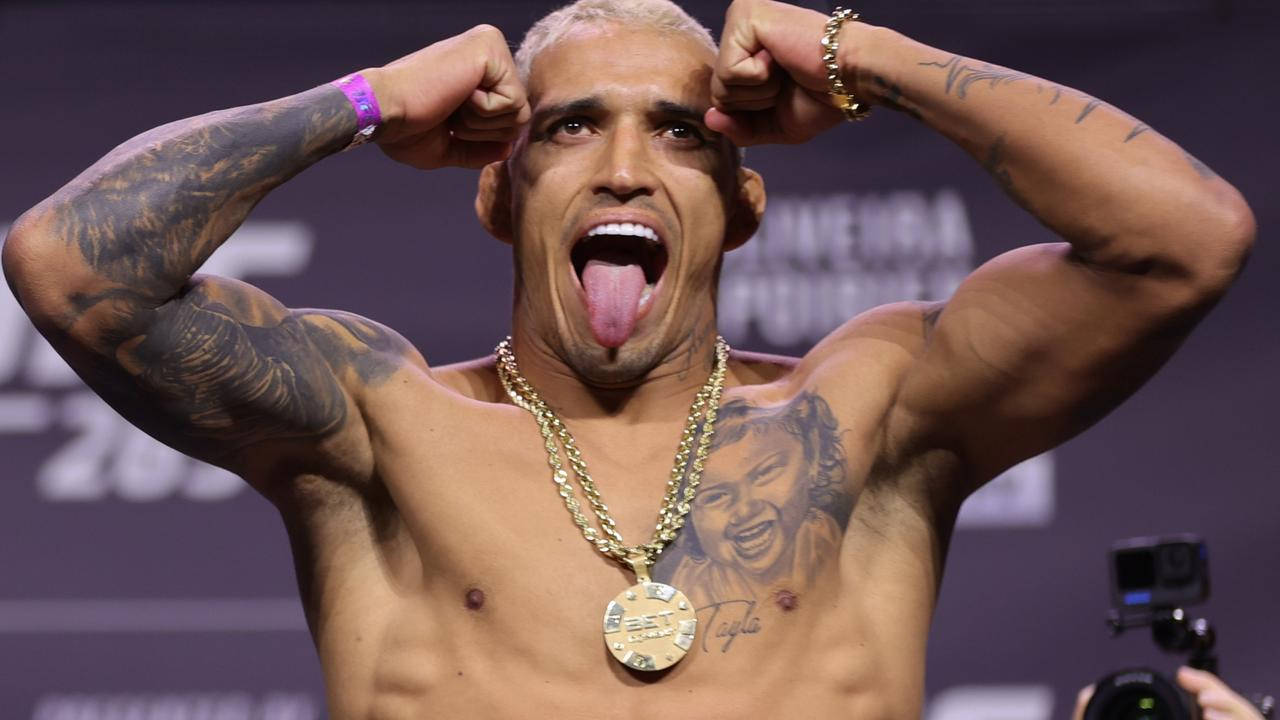 Charles Oliveira Tongue Out Background