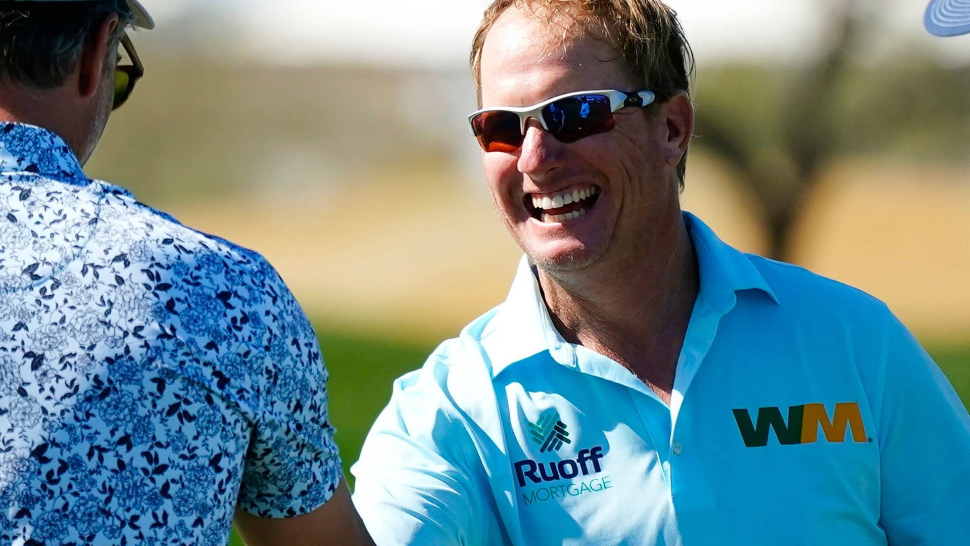 Charley Hoffman Grinning Widely Background