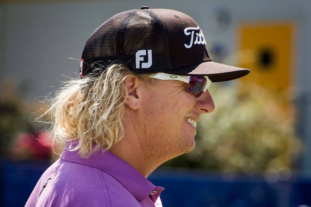 Charley Hoffman In Action At A Golf Tournament Background