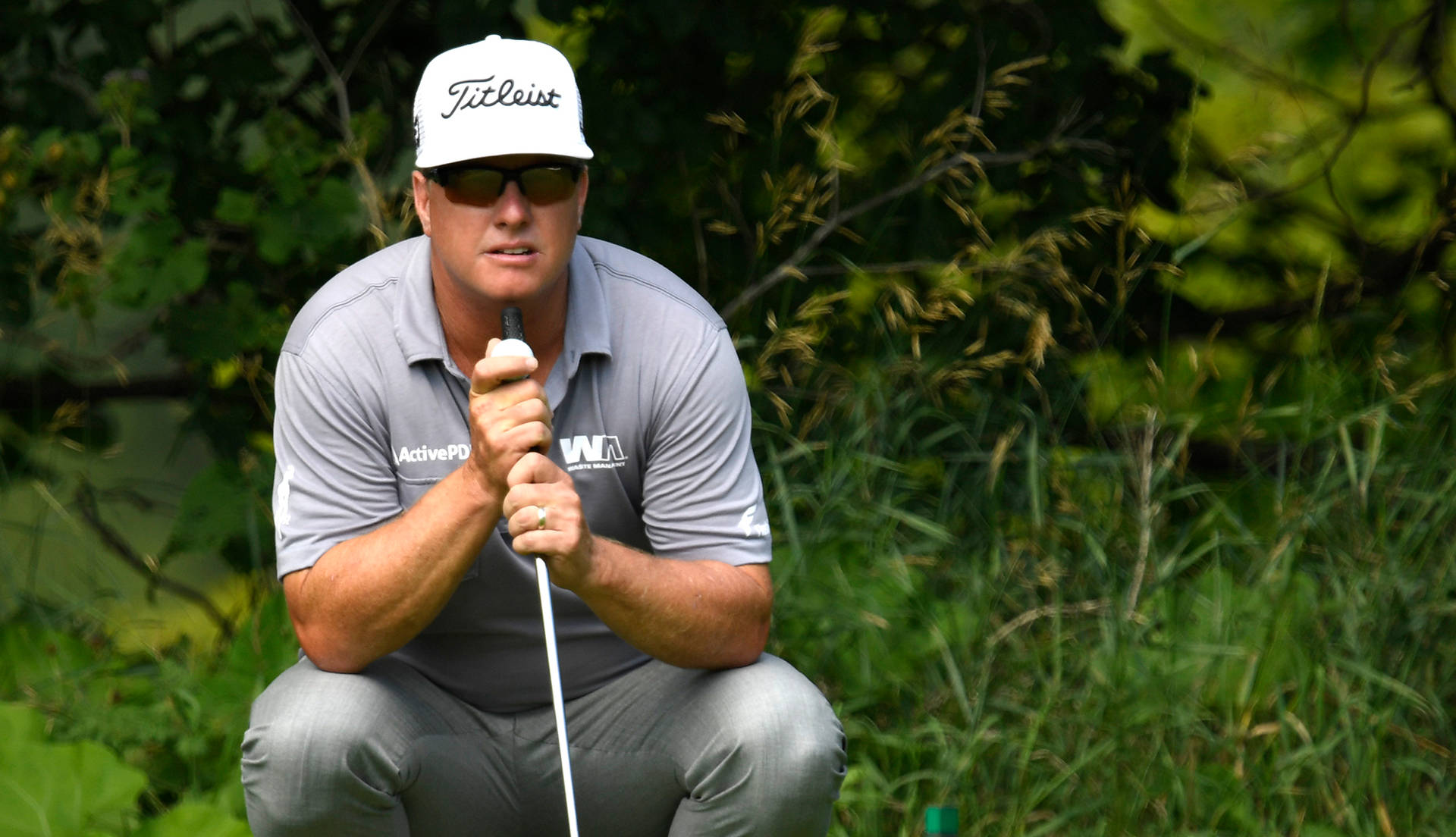 Charley Hoffman In Squatting Position Background