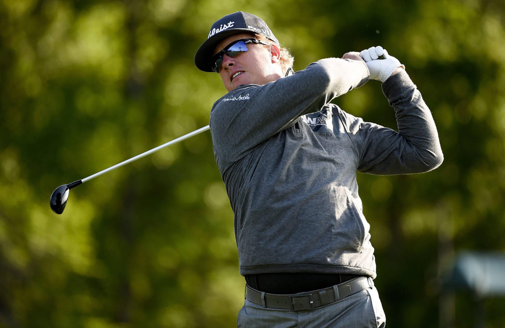 Charley Hoffman Swinging Golf Club Background