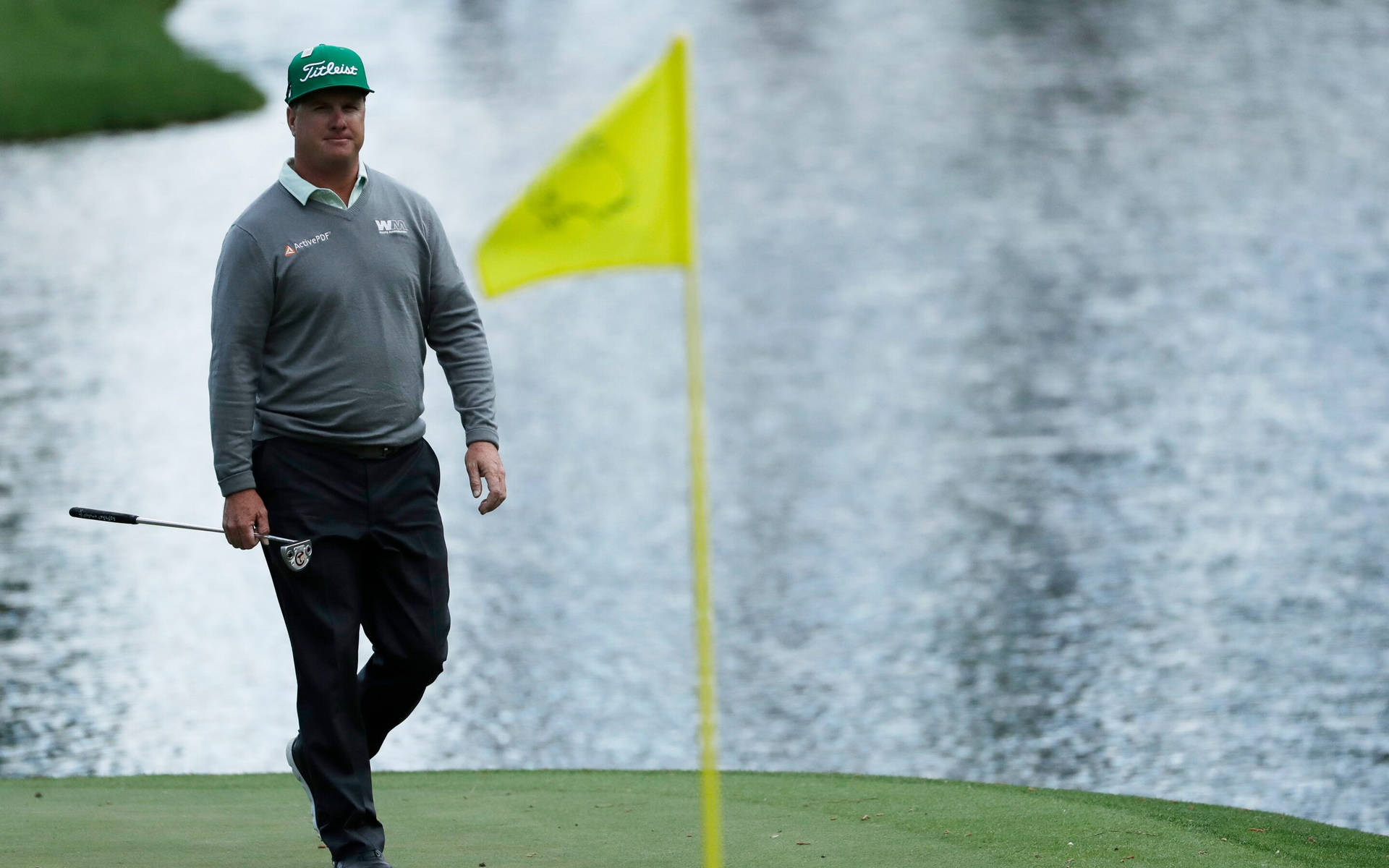 Charley Hoffman Walking On Golf Course Background