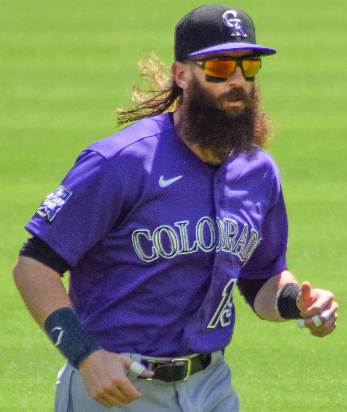 Charlie Blackmon Jogging Across Field Background