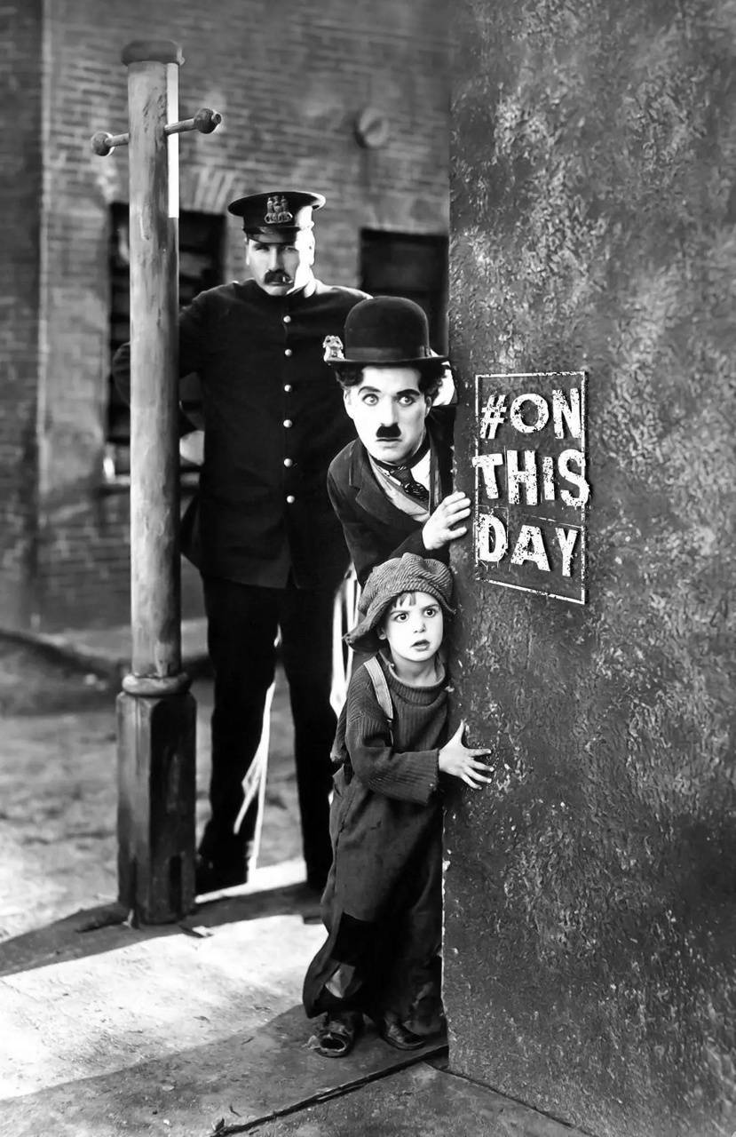 Charlie Chaplin Entertains A Young Fan. Background