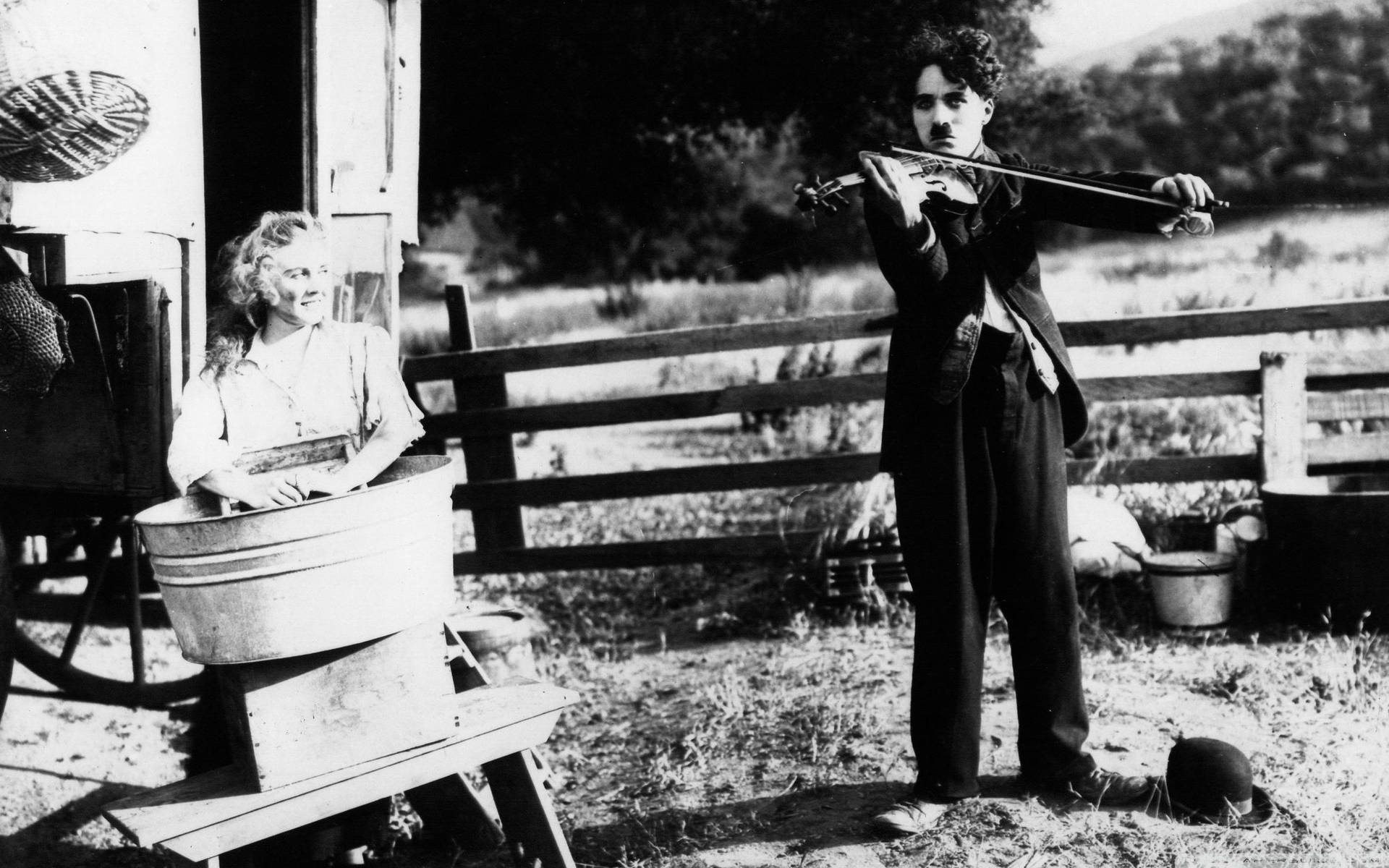 Charlie Chaplin Playing The Violin Background