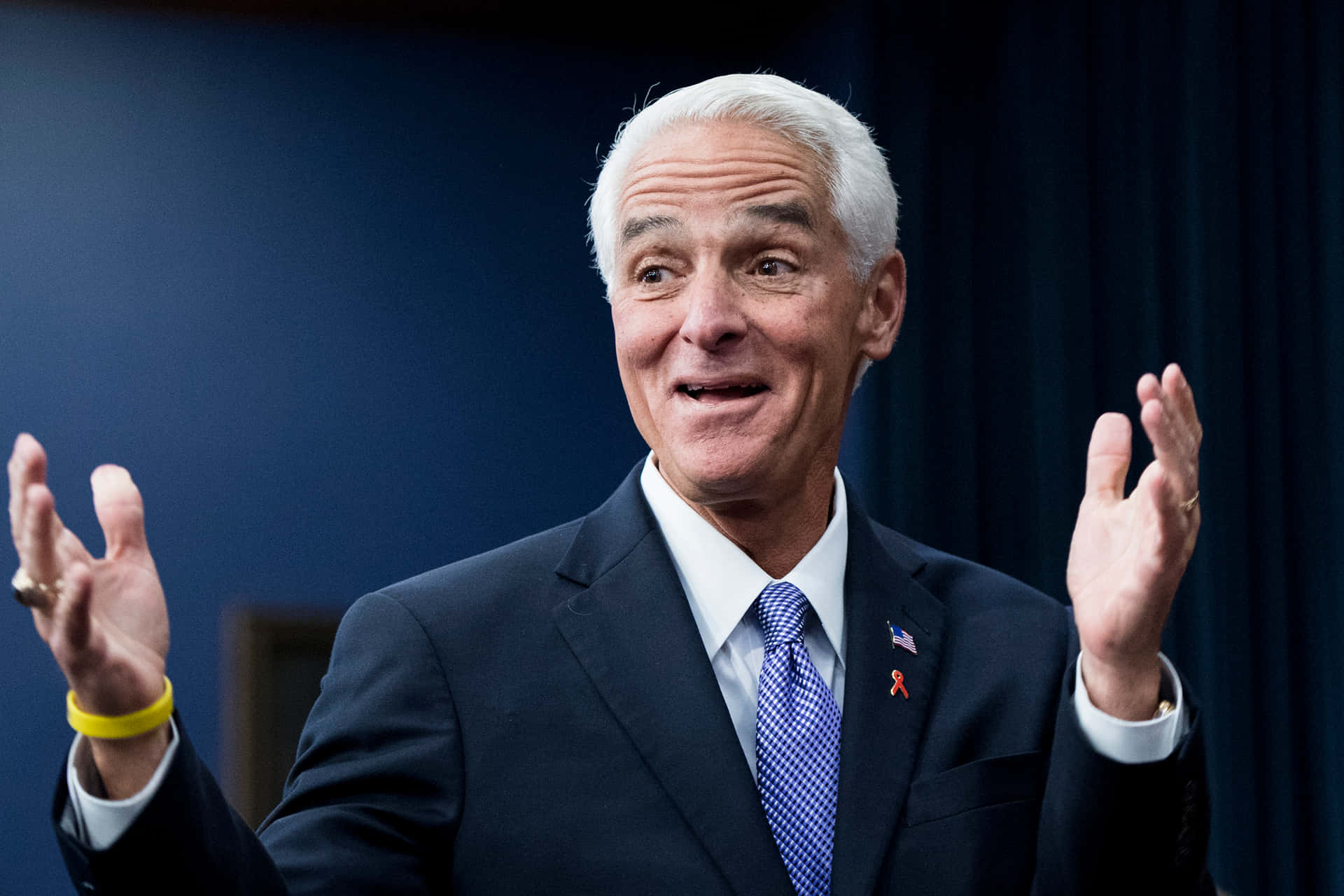 Charlie Crist Hands Up Background