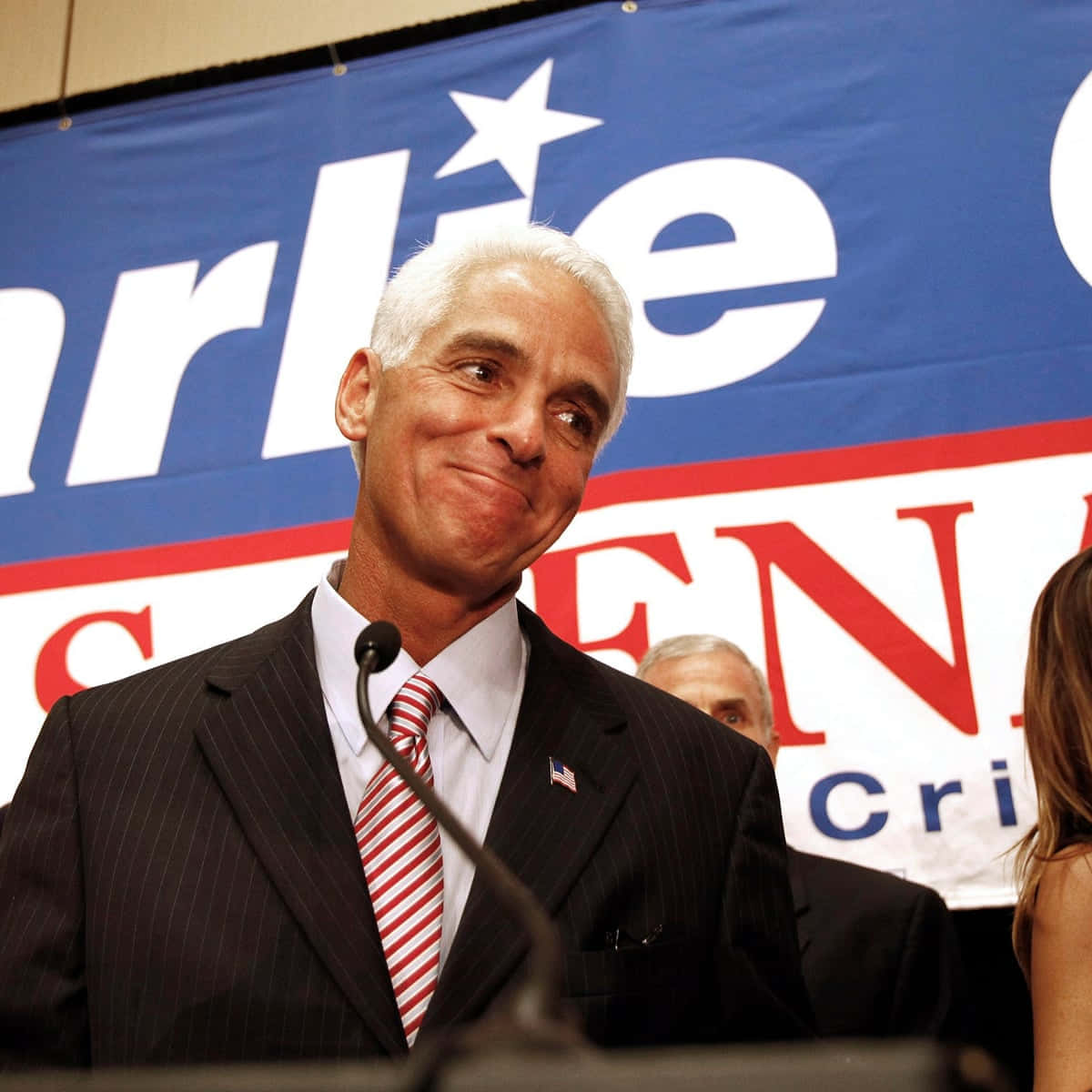 Charlie Crist Smiling At Someone Background