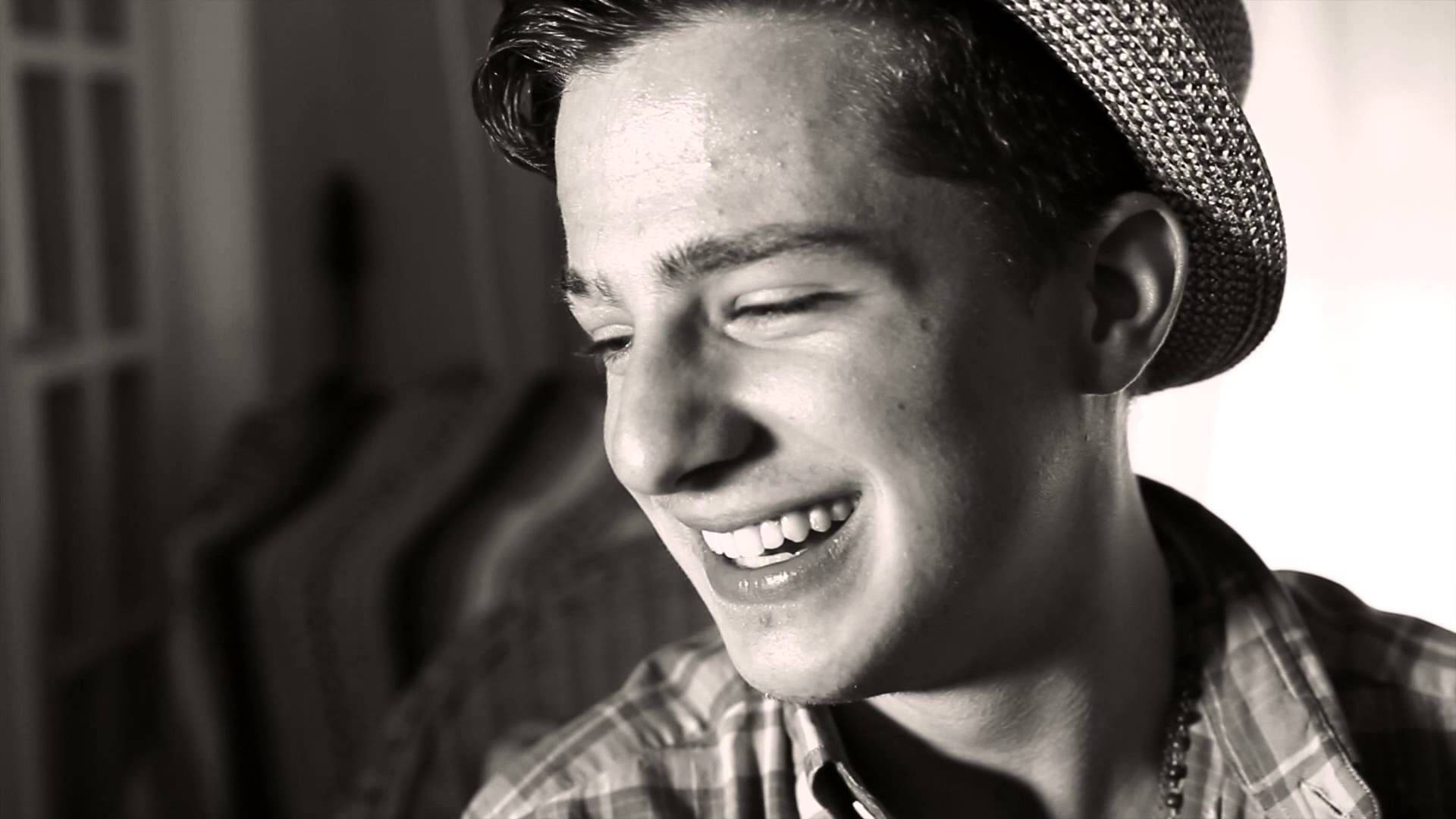 Charlie Puth Widely Smiling