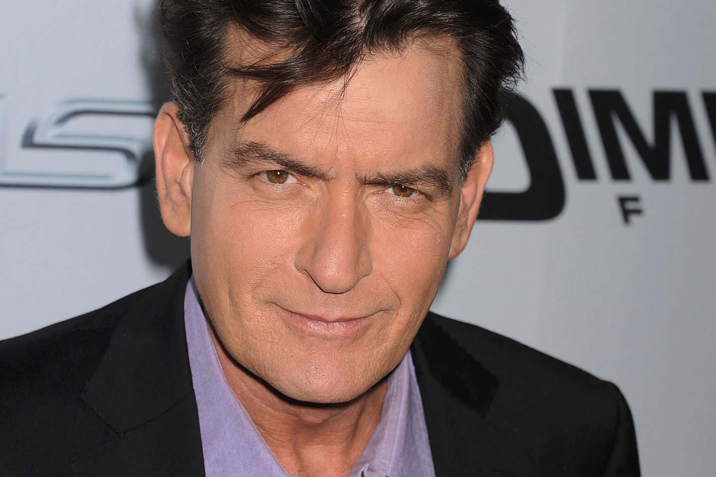 Charlie Sheen In Studio - Iconic Hollywood Actor Background