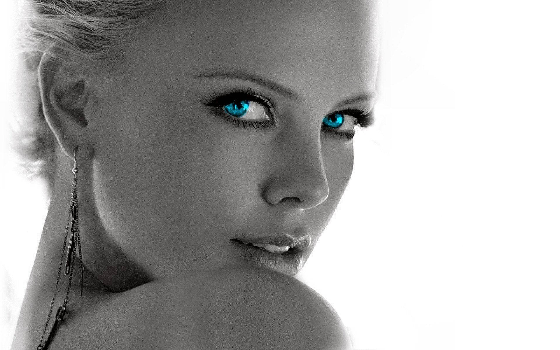 Charlize Theron’s Piercing Blue Eyes Background