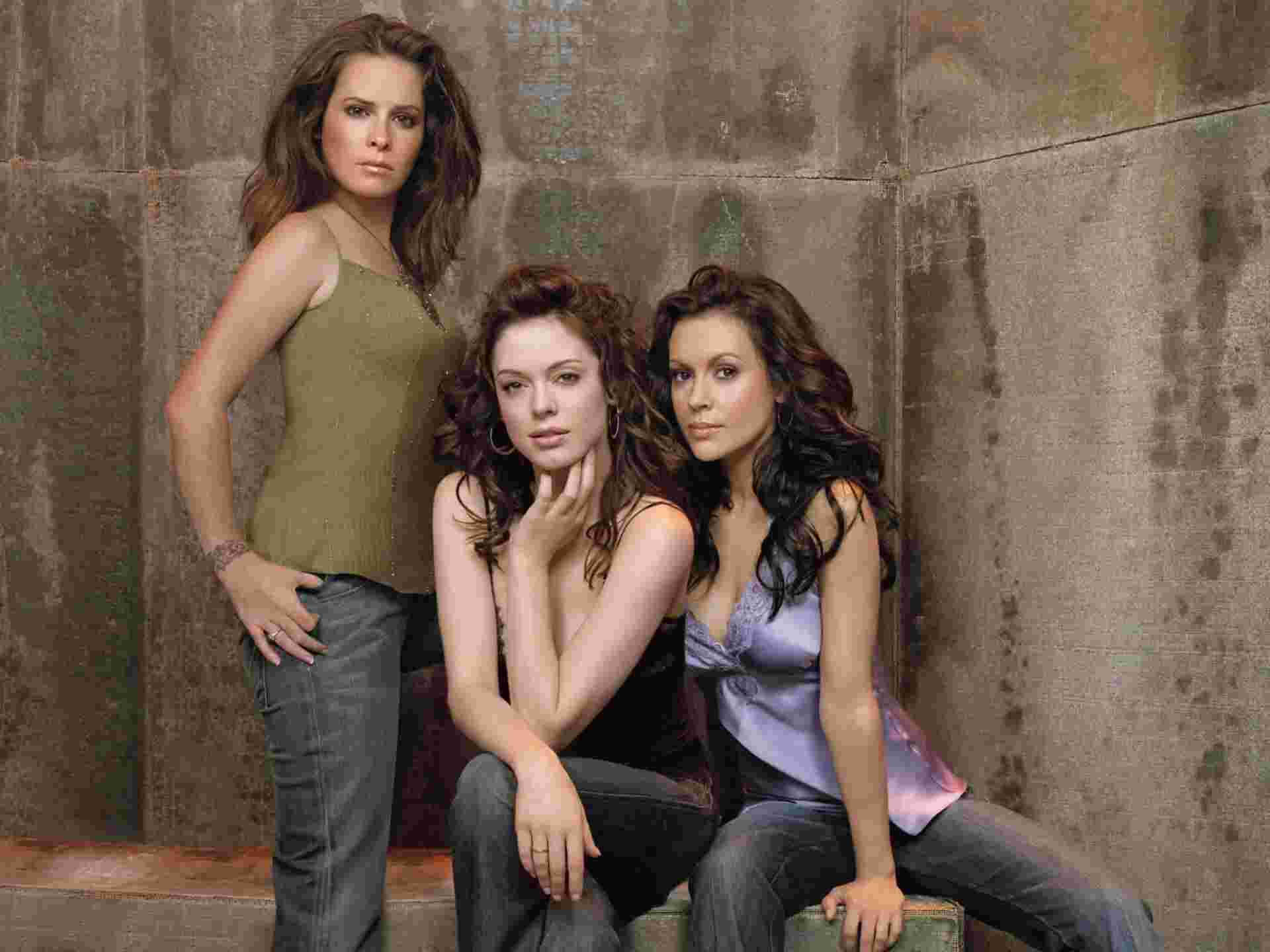 Charmed Characters In Front Of Bare Wall Background