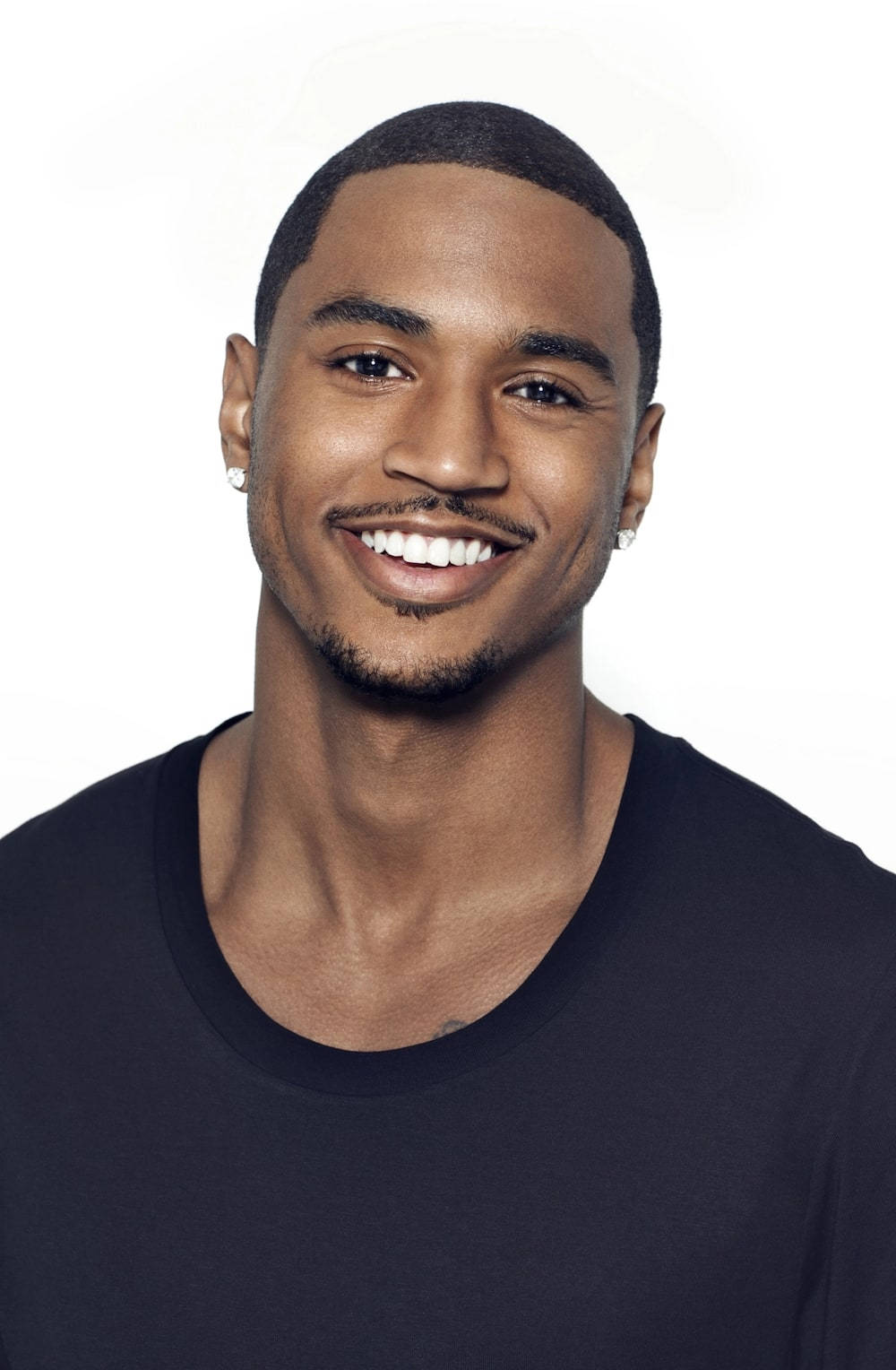 Charming Black Man With An Endearing Smile Background