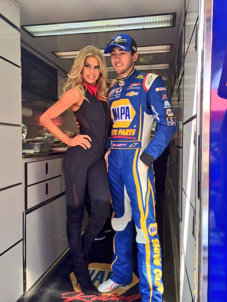 Chase Elliot With A Woman Background