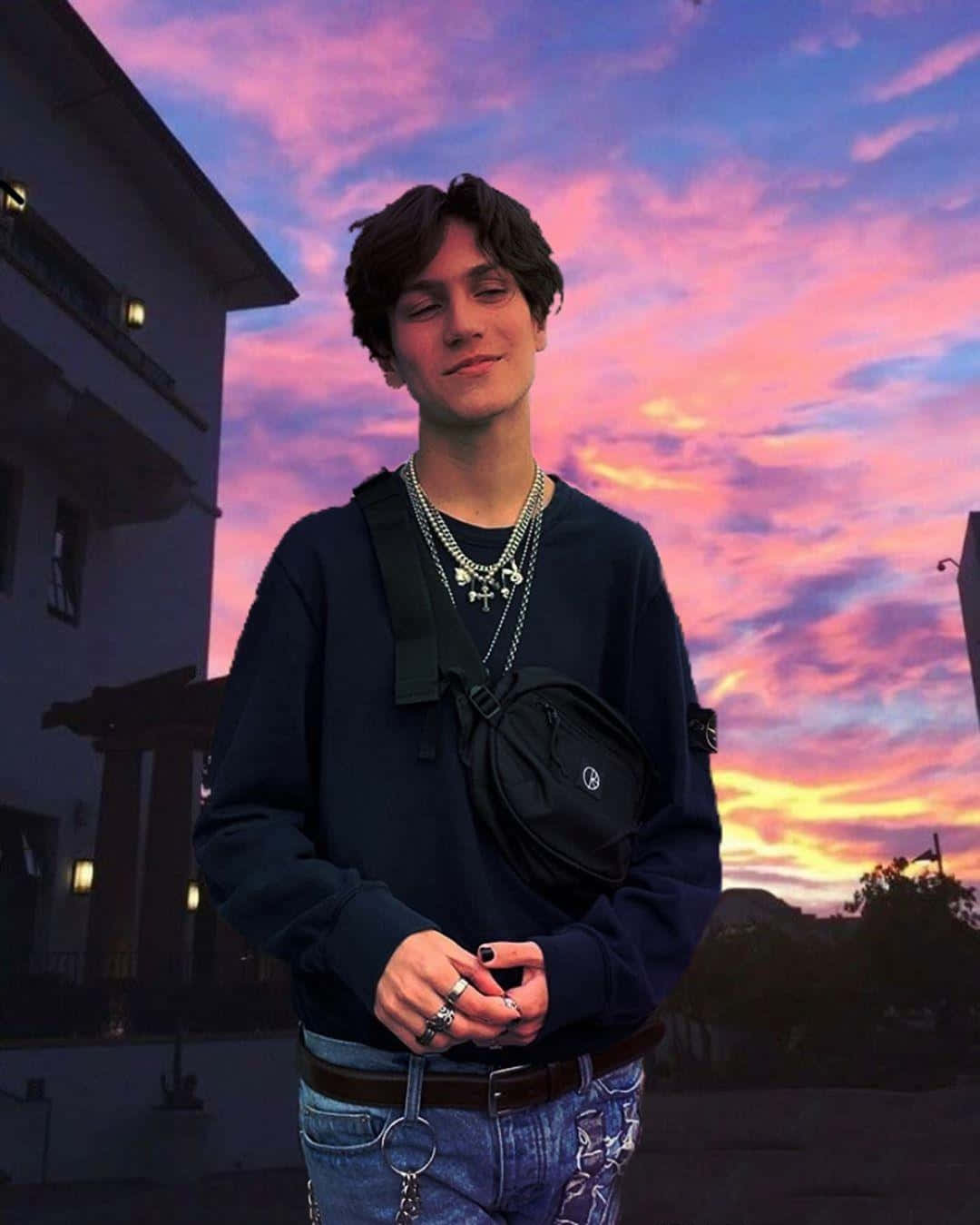 Chase Hudson Black Sweater And His Bling Background
