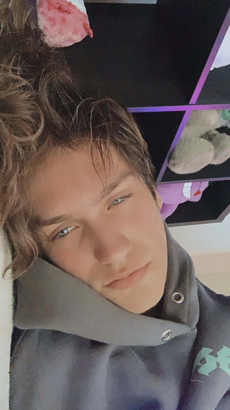 Chase Hudson Gray Hoodie Bed Selfie Background