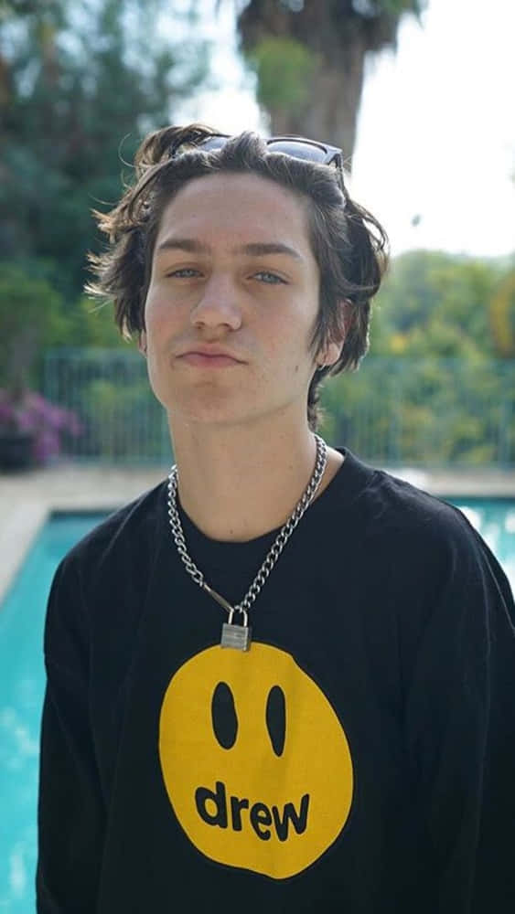 Chase Hudson Looking Confident. Background