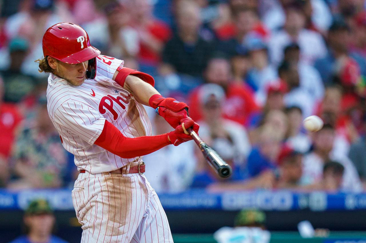 Chase Utley In Action For Philadelphia Phillies Background