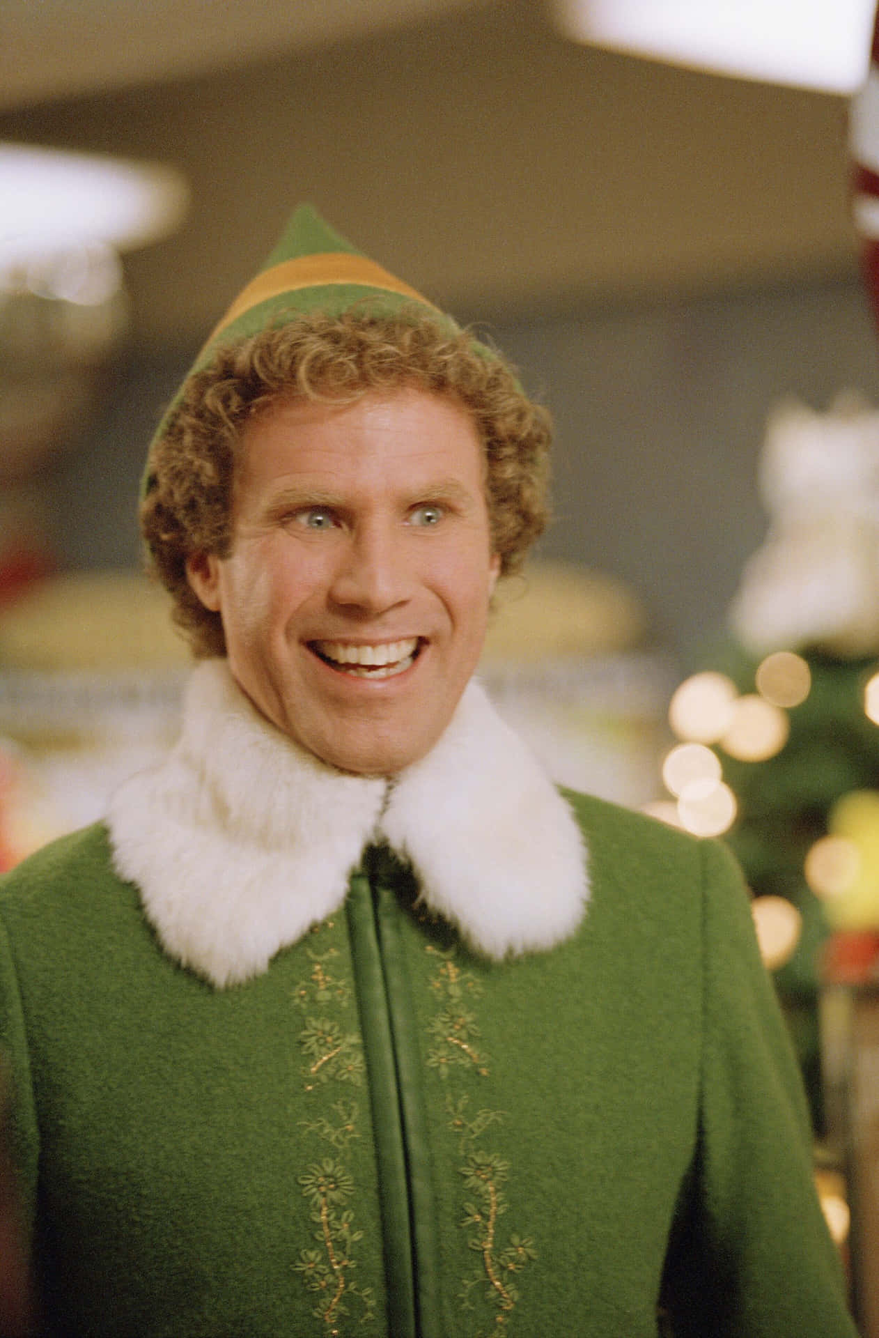 Chase Your Dreams And Spread Christmas Joy Like Buddy The Elf Background
