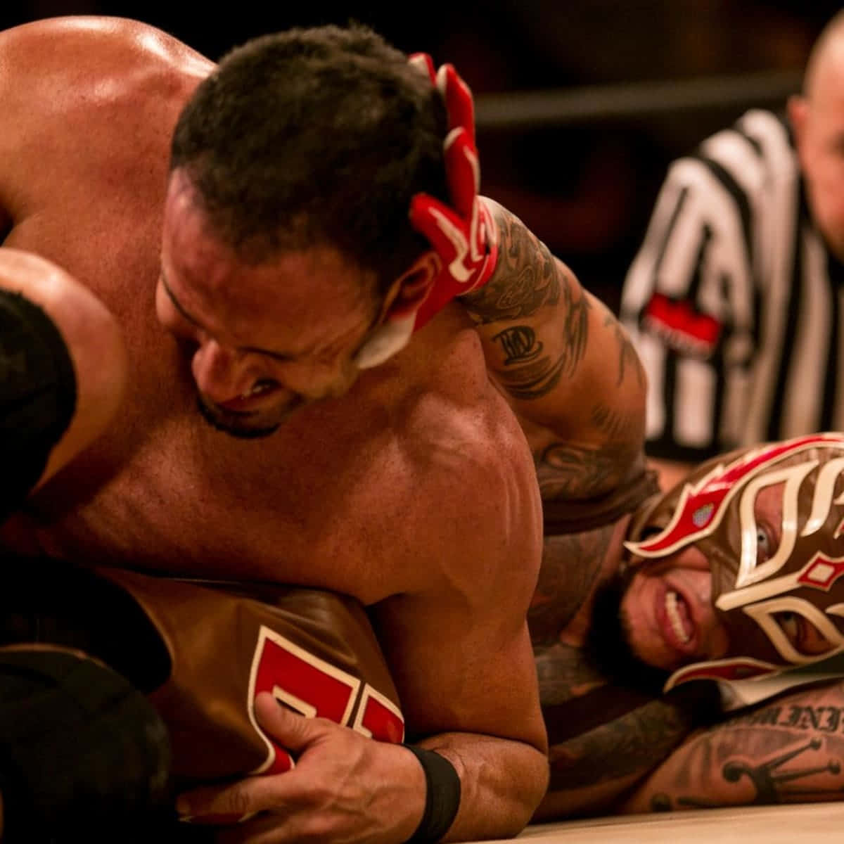 Chavo Guerrero Against Rey Mysterio Background