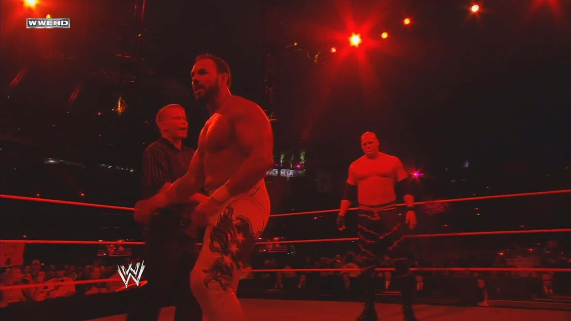 Chavo Guerrero Faces Off Against Cain In An Electrifying Wrestling Match Background
