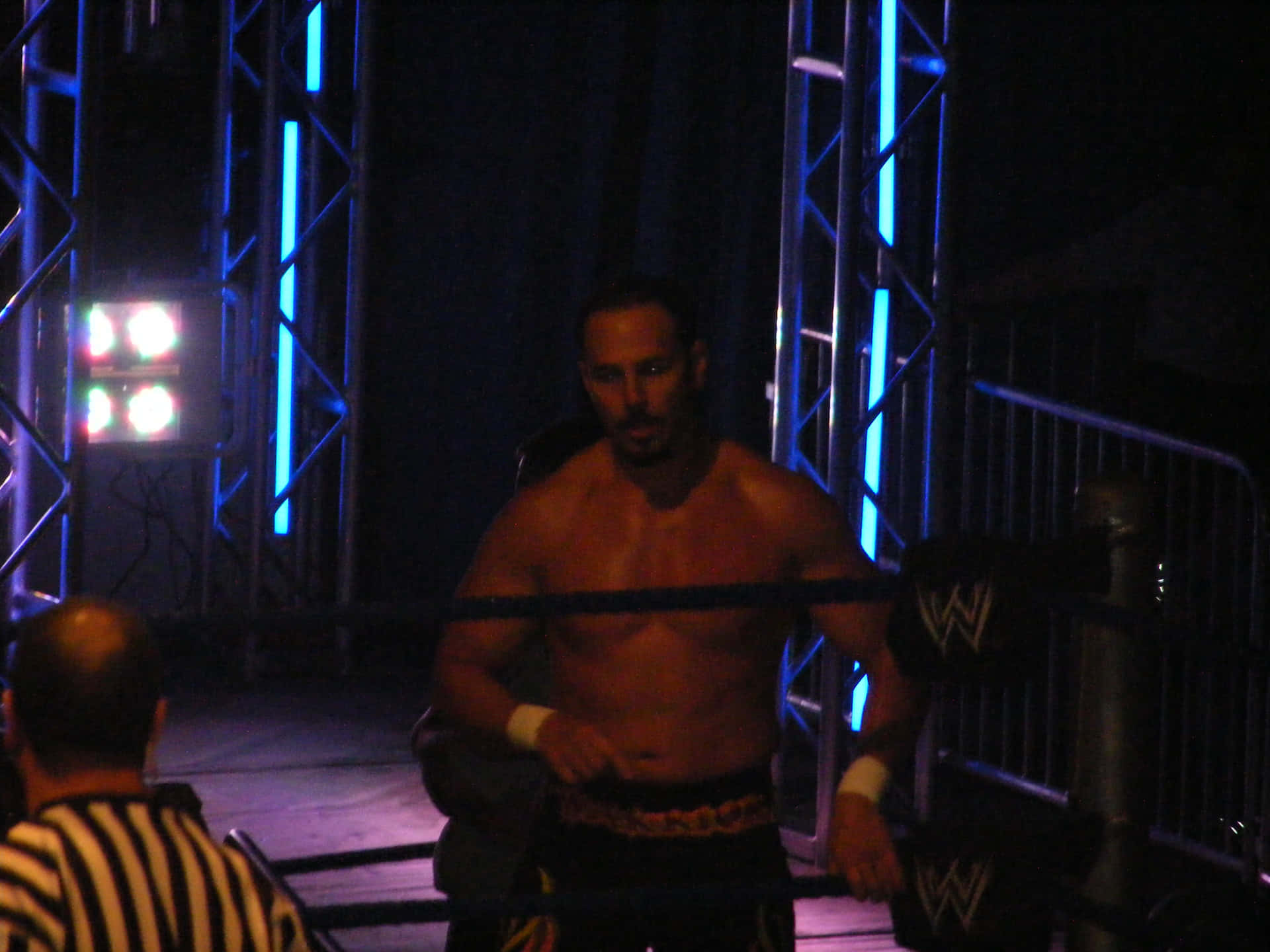Chavo Guerrero In A Dim Arena Background