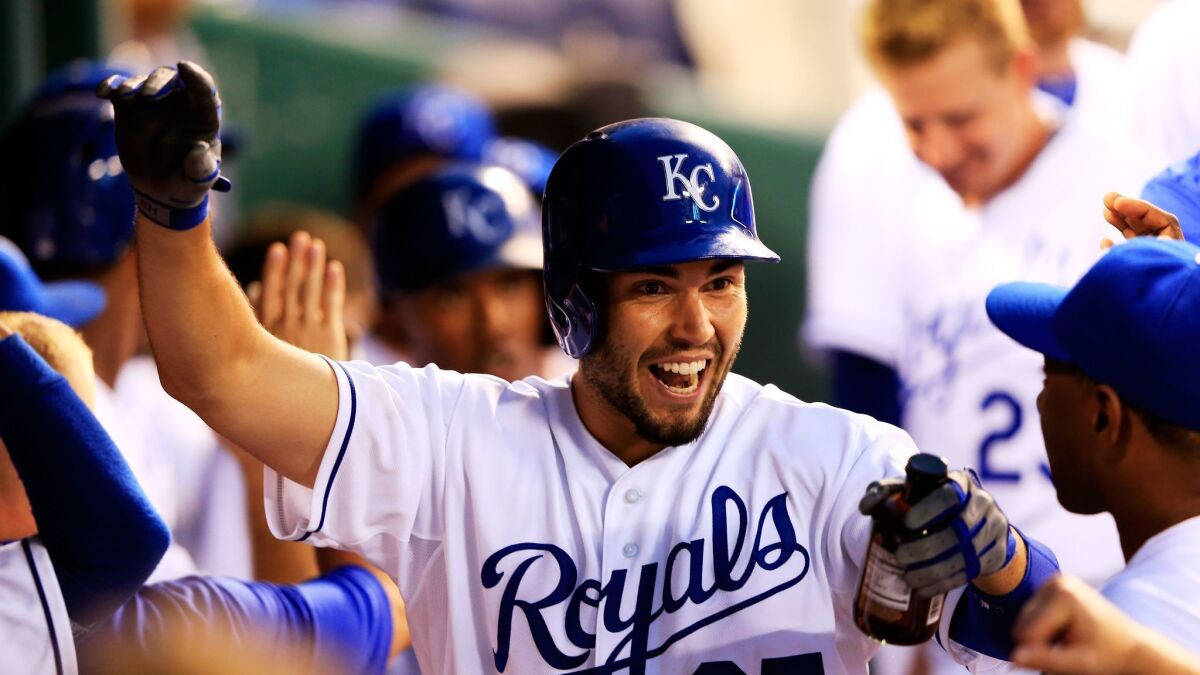 Cheerful Eric Hosmer With Teammates Background