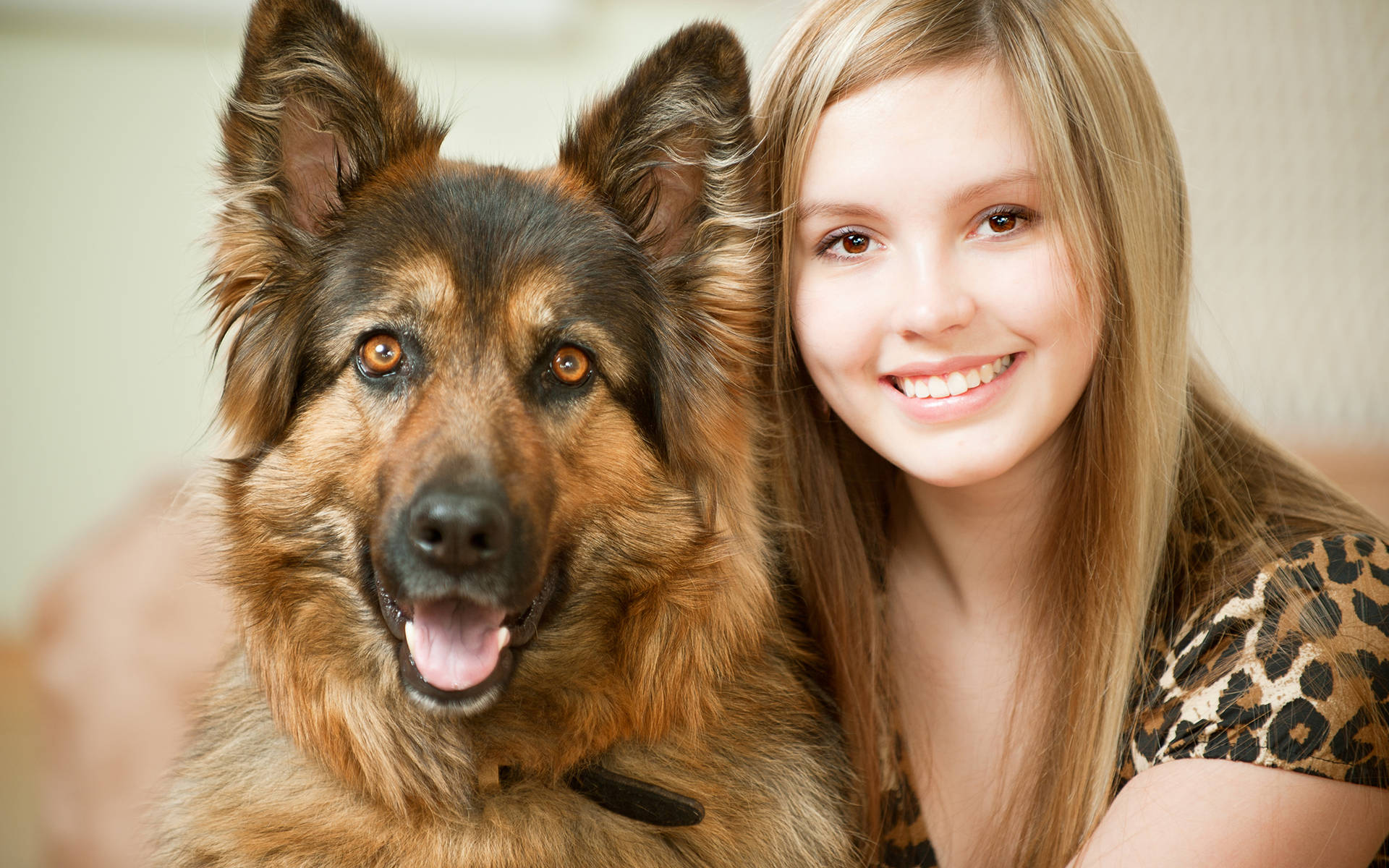 Cheerful Girl With Playful Canine Companion Background