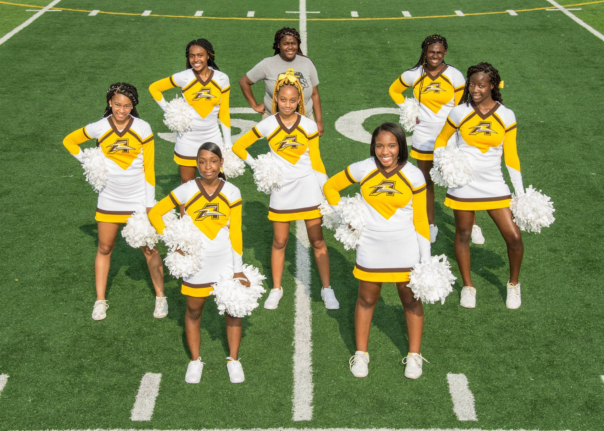 Cheerleading In Yellow Background