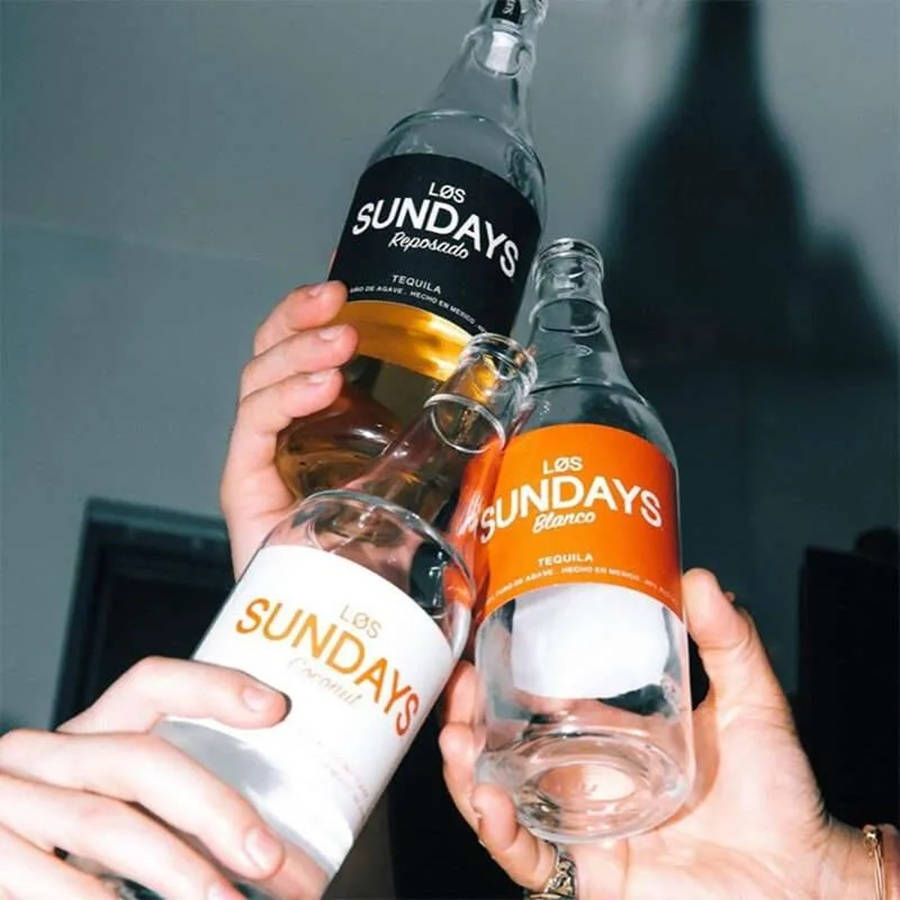 Cheers To The Weekend With Los Sundays Reposado Tequila Background