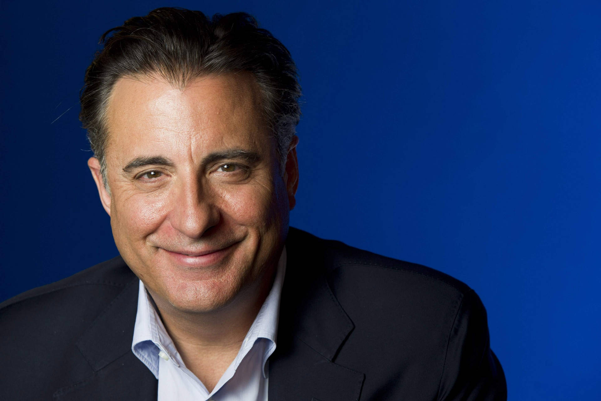 Cheery Actor Headshot Of Andy Garcia Background