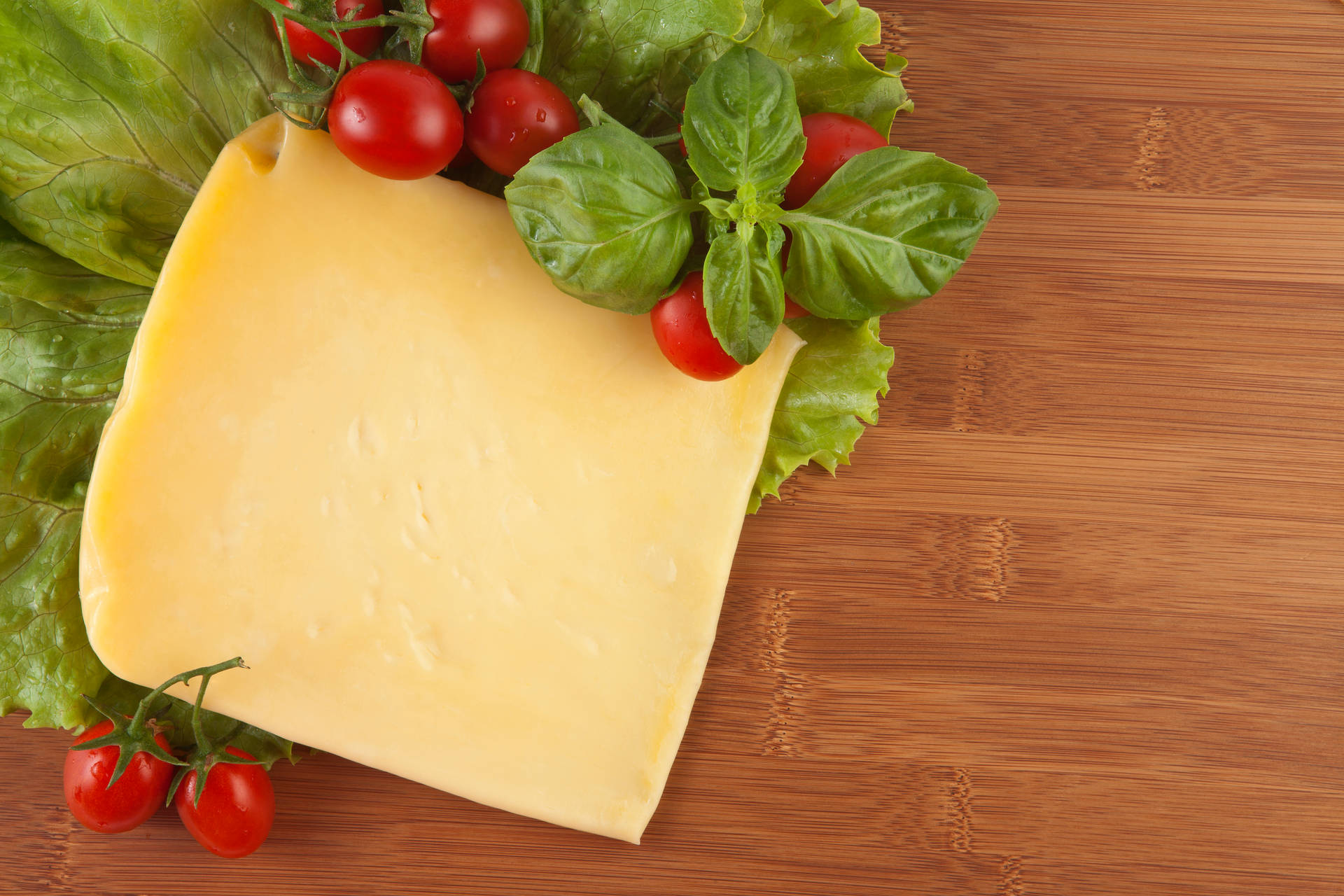 Cheese Slice With Cherry Tomatoes Background