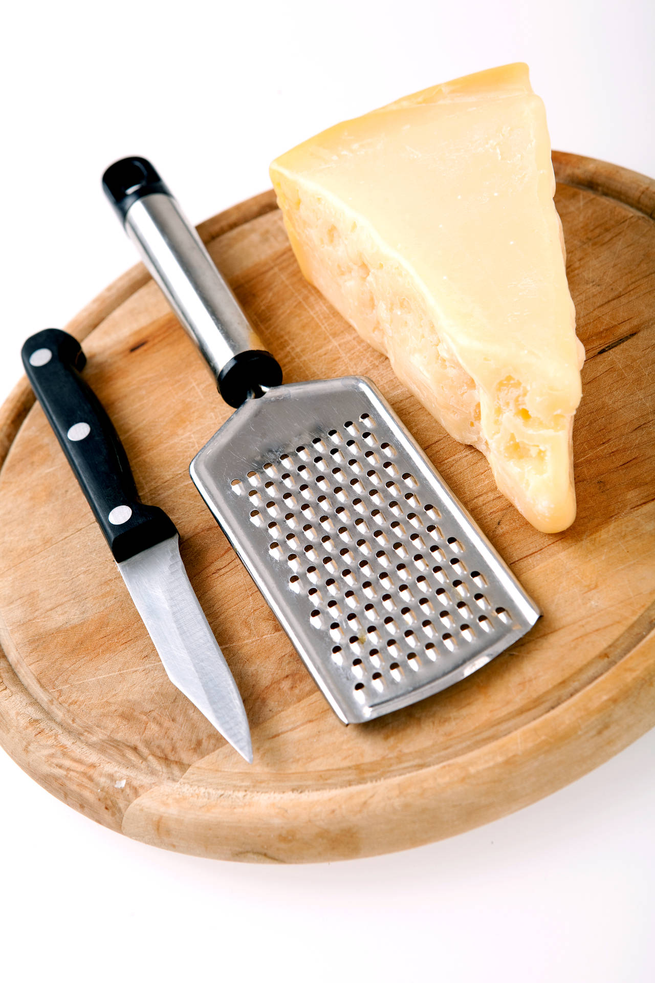 Cheese With Grater And Knife Background