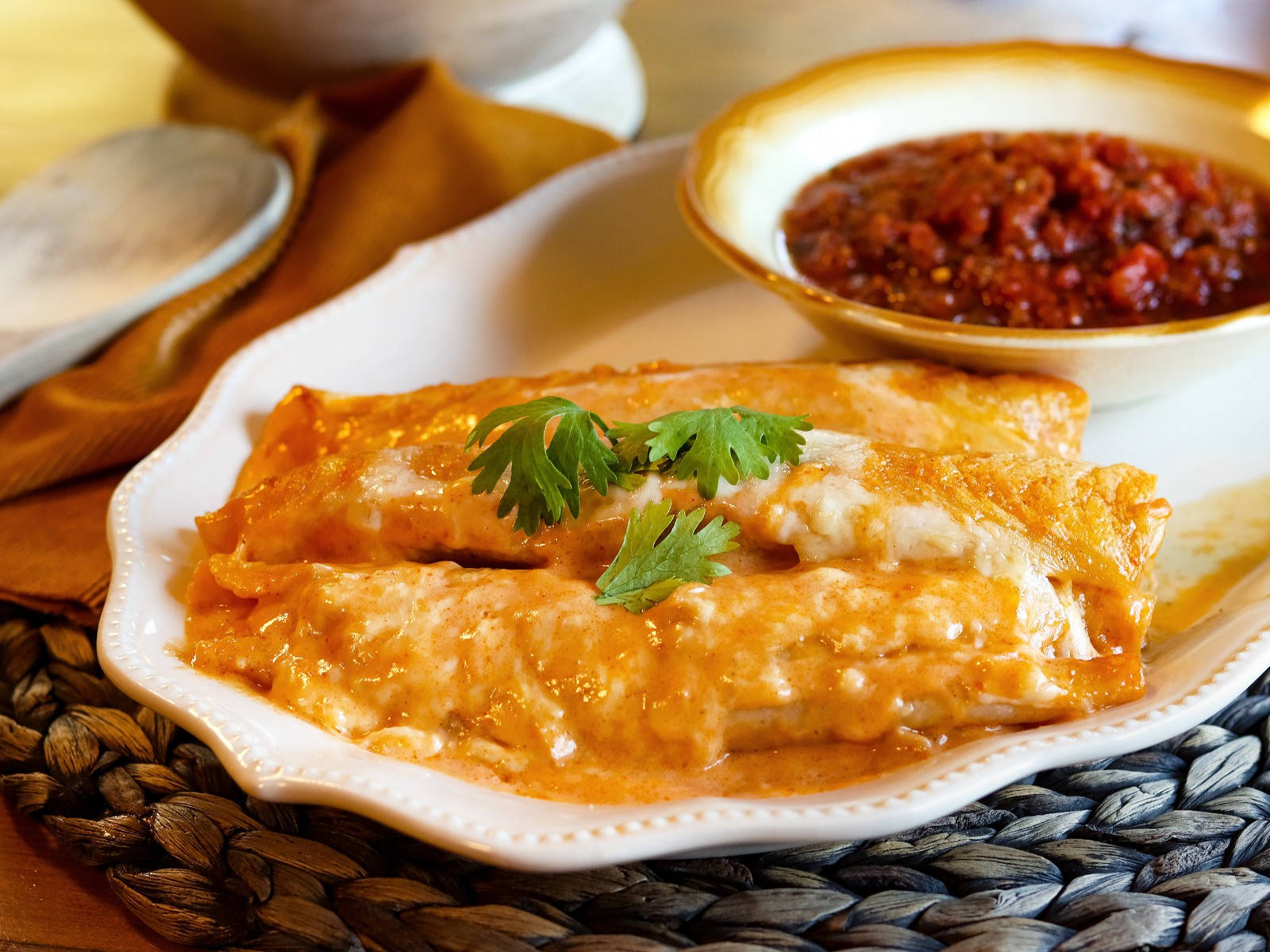 Cheesy Enchiladas Plate With A Salsa Bowl