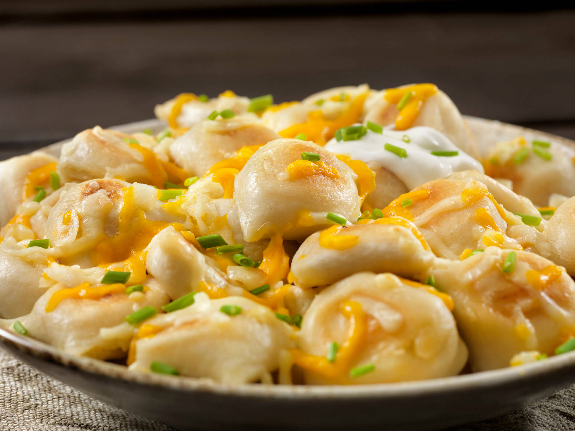 Cheesy Pierogi Dish Background