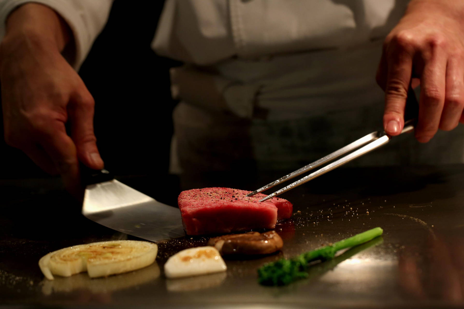 Chef Cooking Fresh Kobe Beef Background