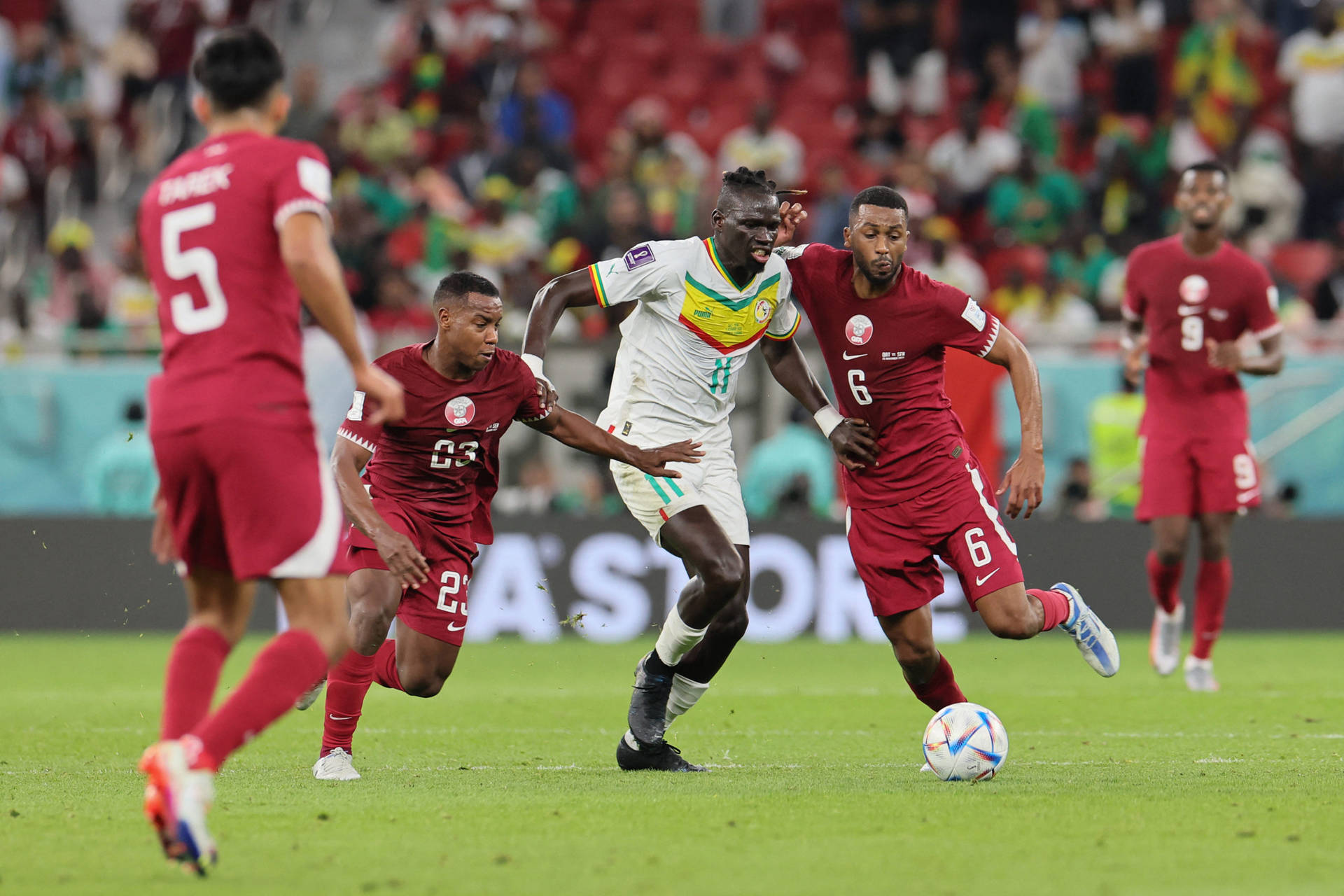 Cheikhou Kouyate Leading The Senegal National Football Team Background